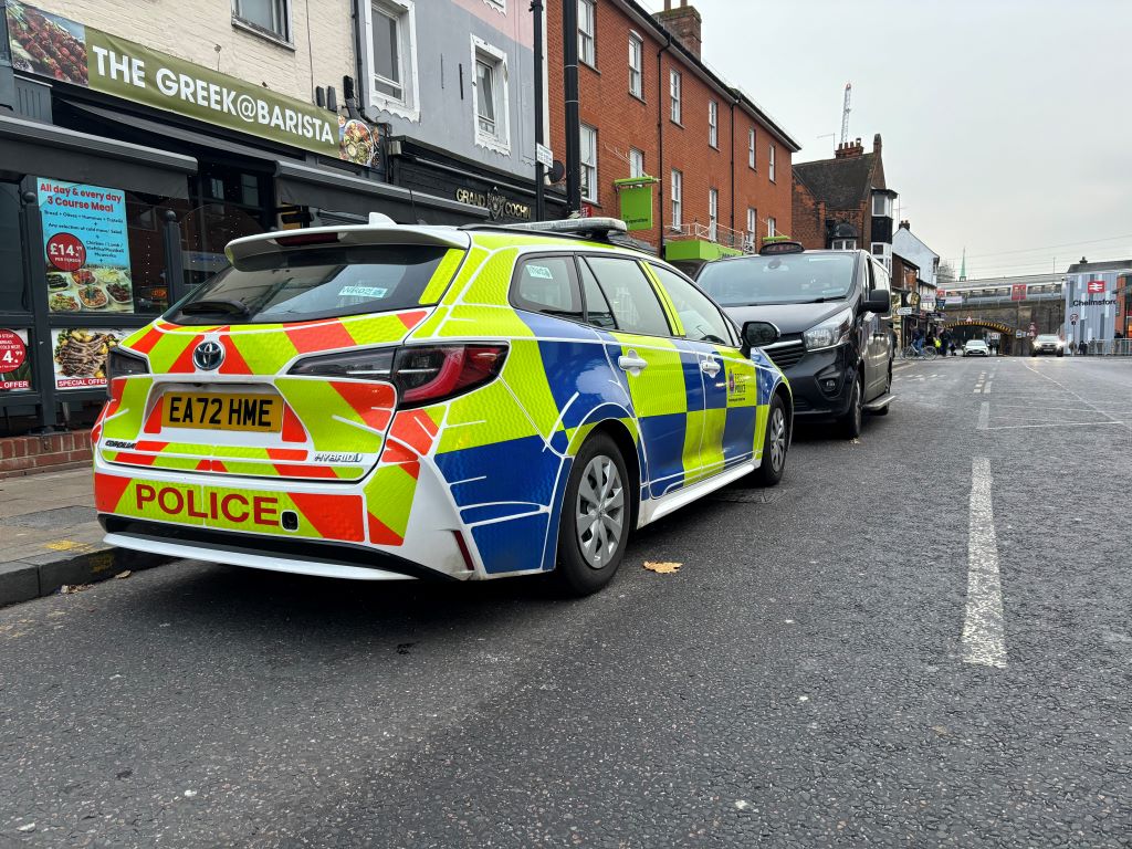 Essex Police cars parked in the street