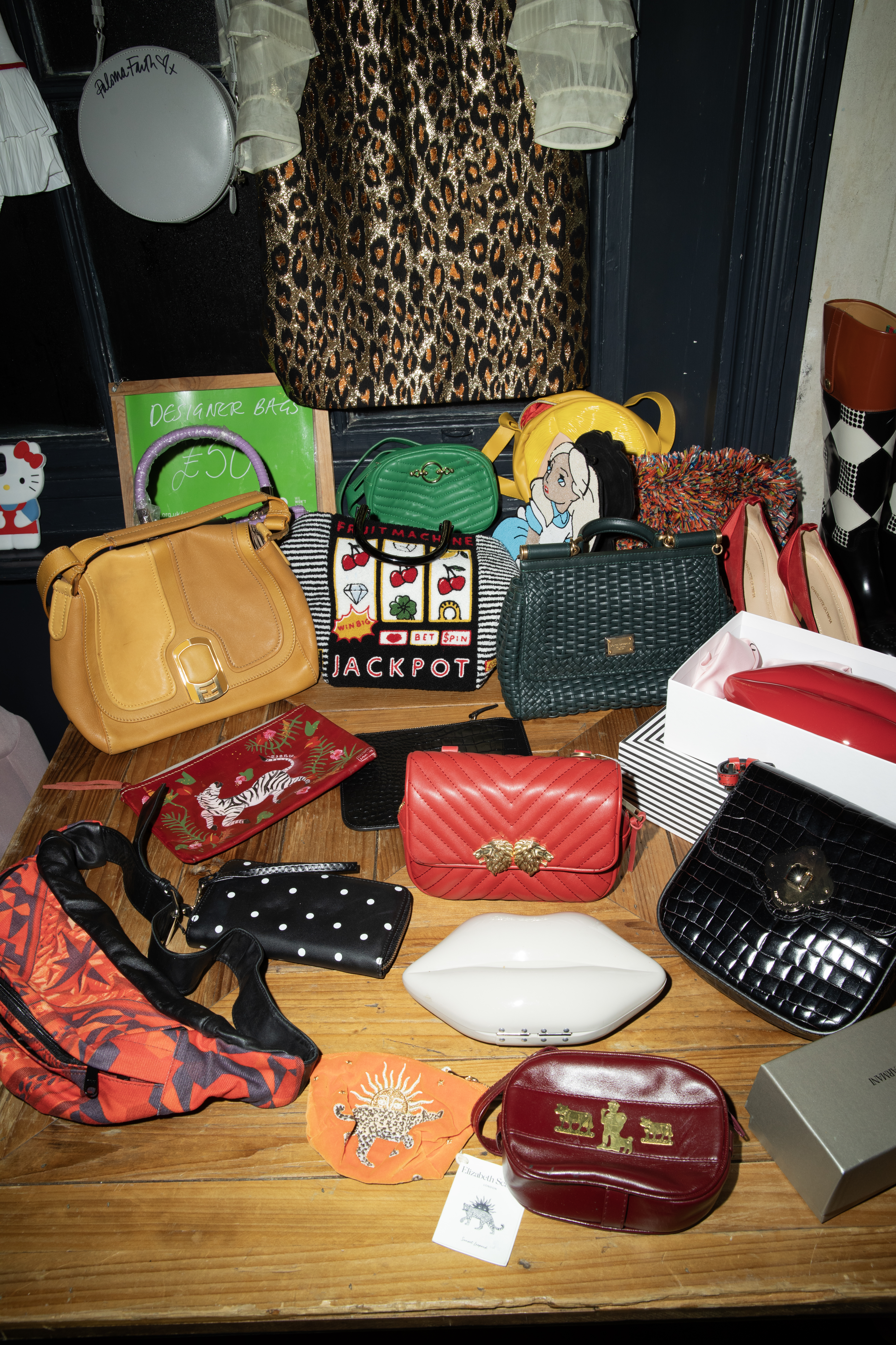 Paloma Faith's handbags and accessories on a table