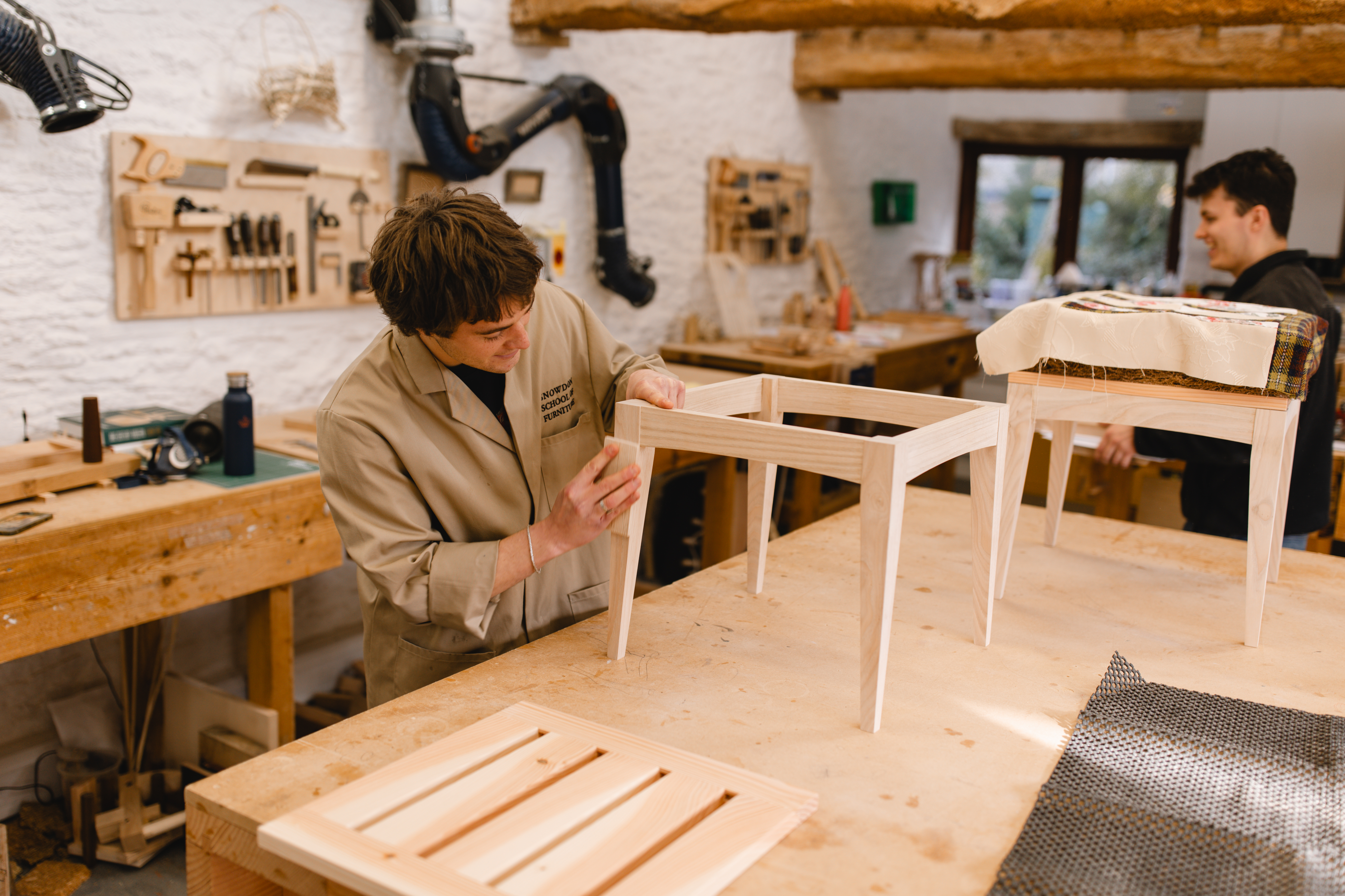 Graduates working on the stools at Highgrove 