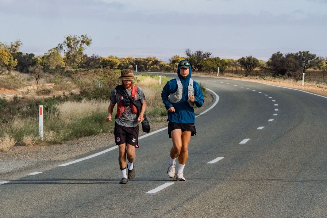 Two men running