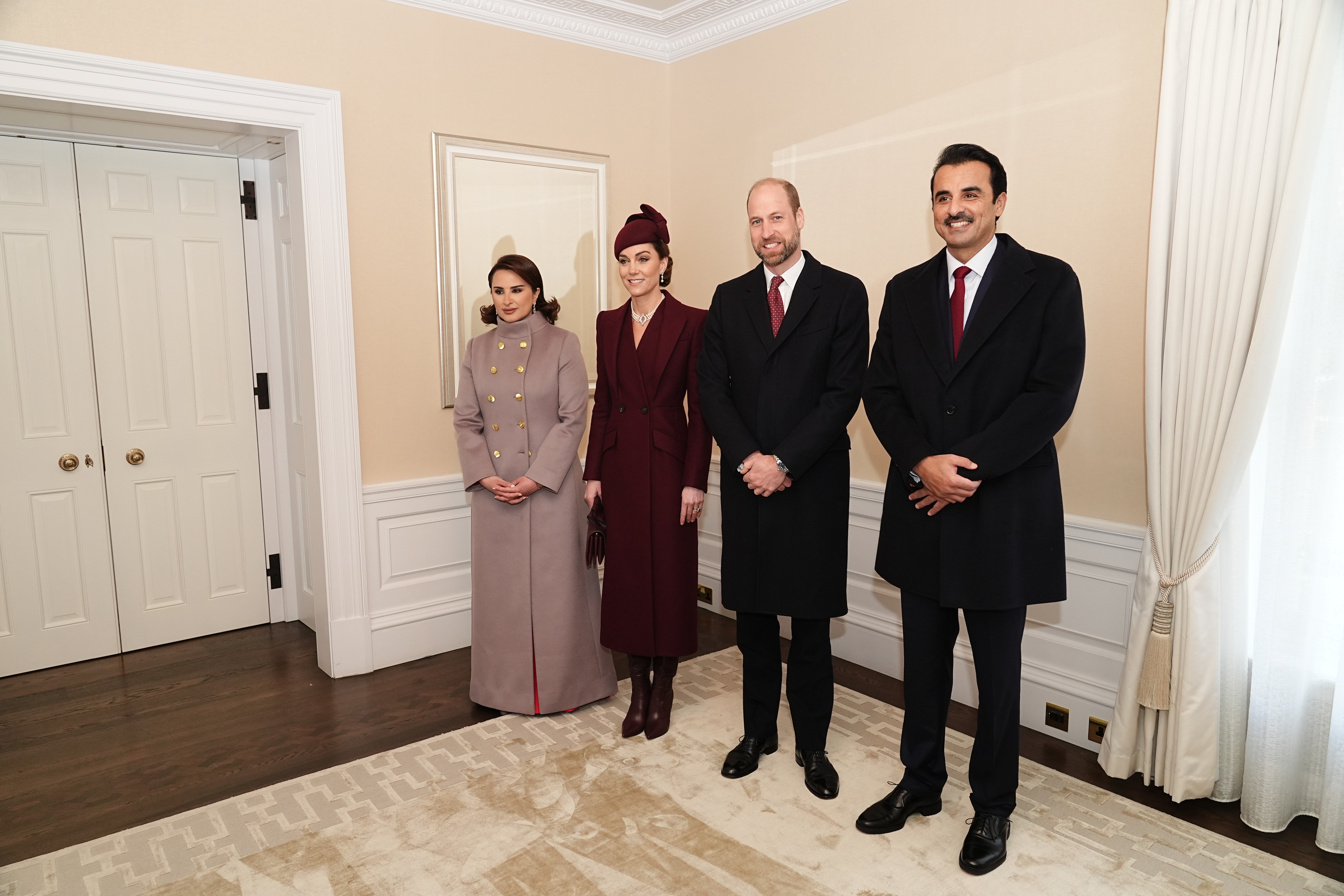 The Prince and Princess of Wales greet the Emir of Qatar Sheikh Tamim bin Hamad Al Thani (right) and his wife Sheikha Jawaher (left)