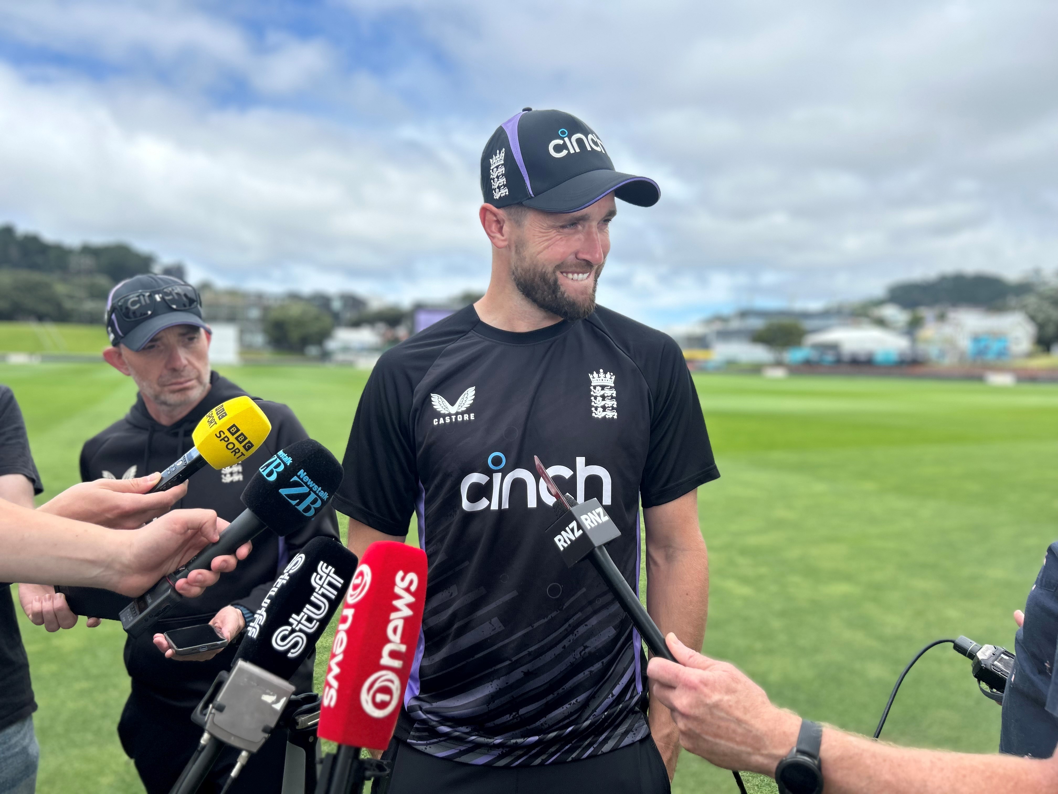 Chris Woakes takes media questions on the outfield at Wellington's Basin Reserve.