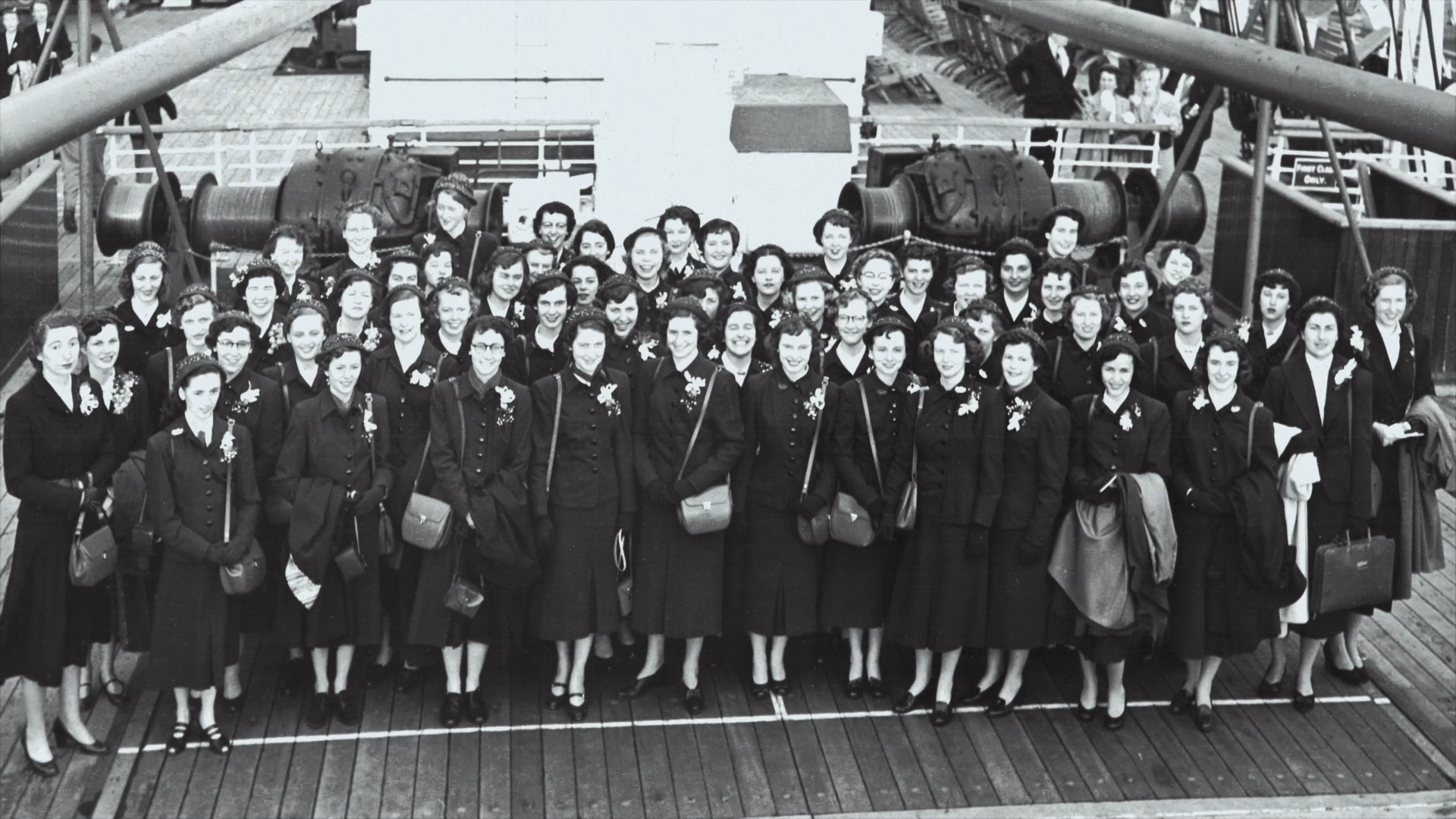 Young women from Canada aboard a ship on their journey to attend the coronation of Queen Elizabeth II in the summer of 1953