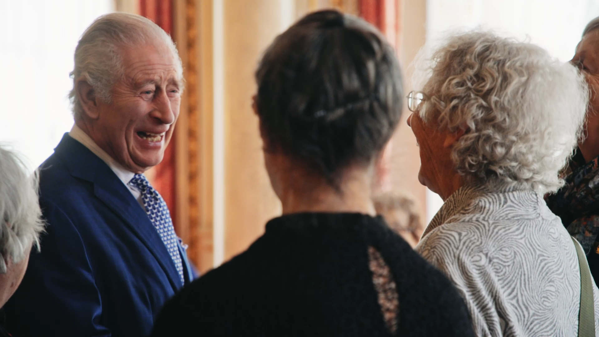 The King surprises 12 of the Coronation Girls during a visit to Buckingham Palace in December 2023