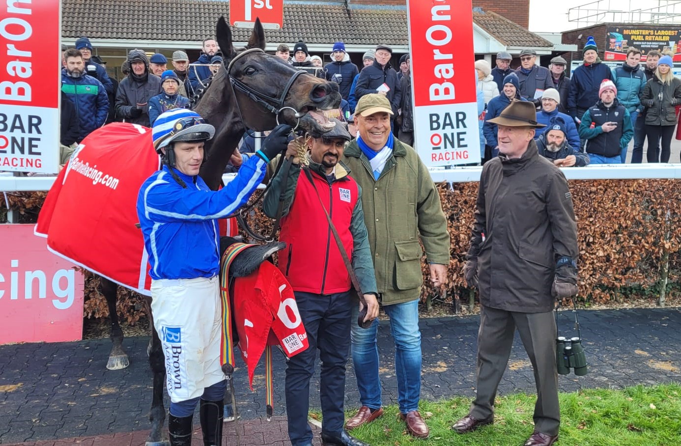 Energumene with Paul Townend and Willie Mullins (right) after winning the Hilly Way Chase at Cork