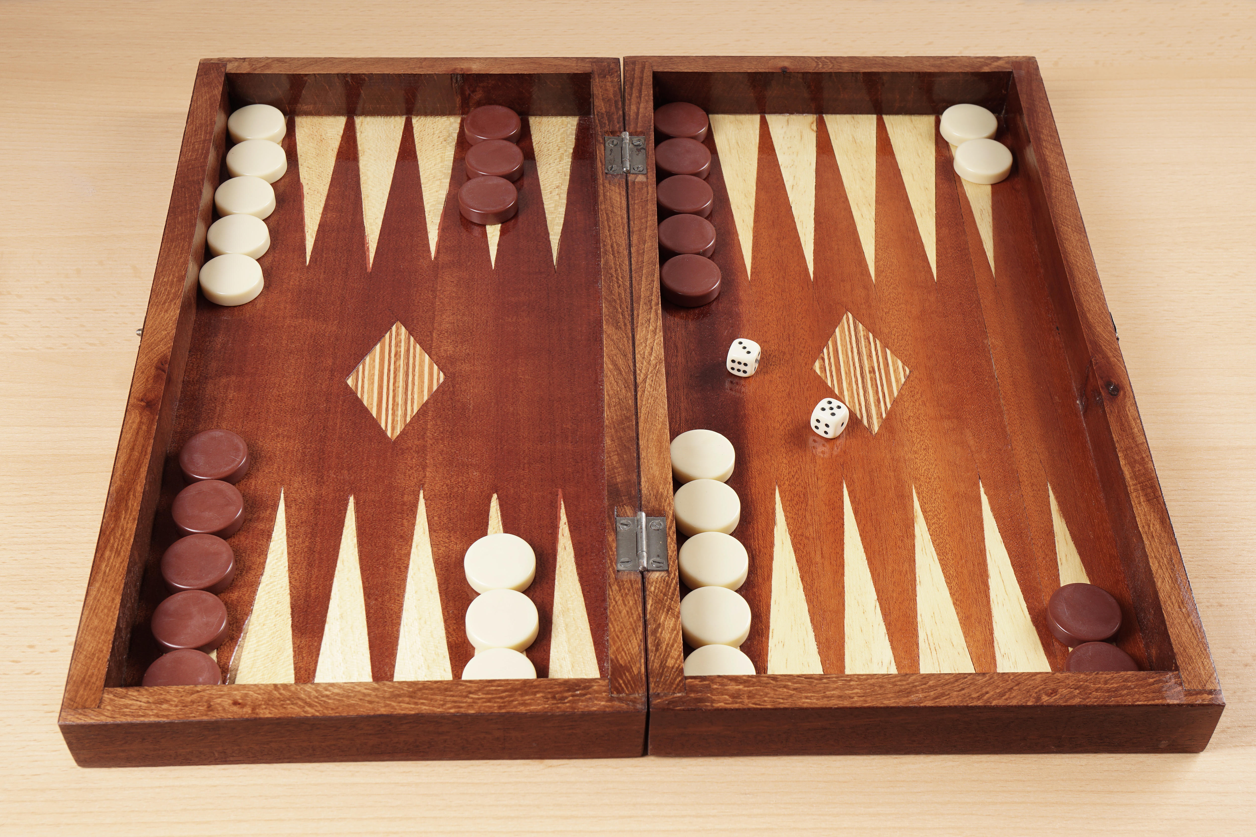 A wooden backgammon board