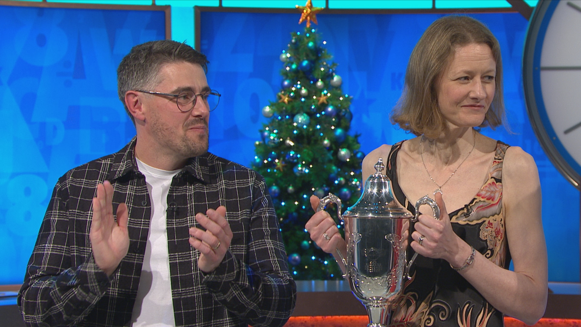 Colin Murray and Fiona Wood, who is holding her trophy