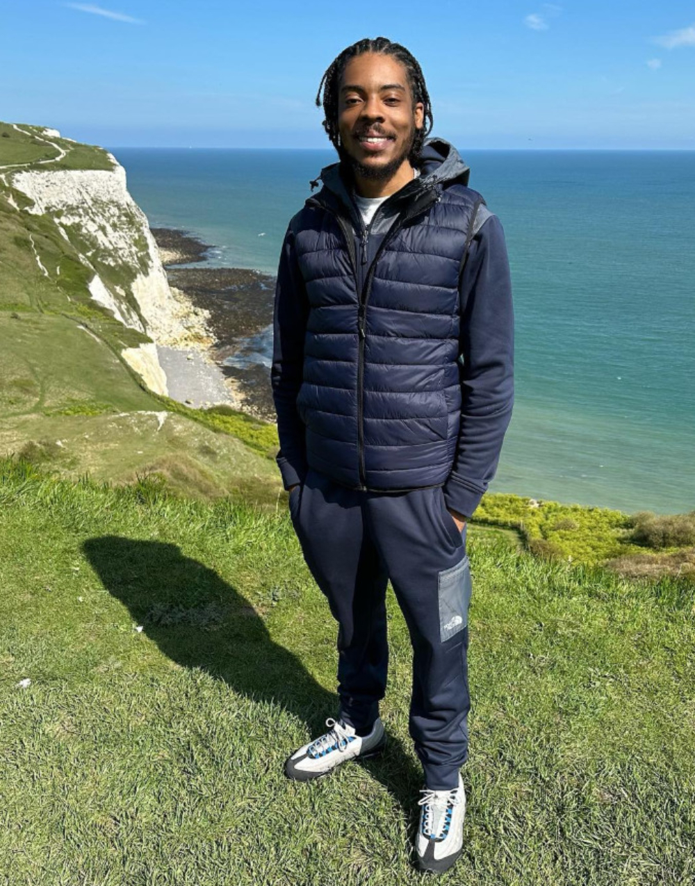 Manny Wallace, known as Big Manny on TikTok, standing by a cliff edge