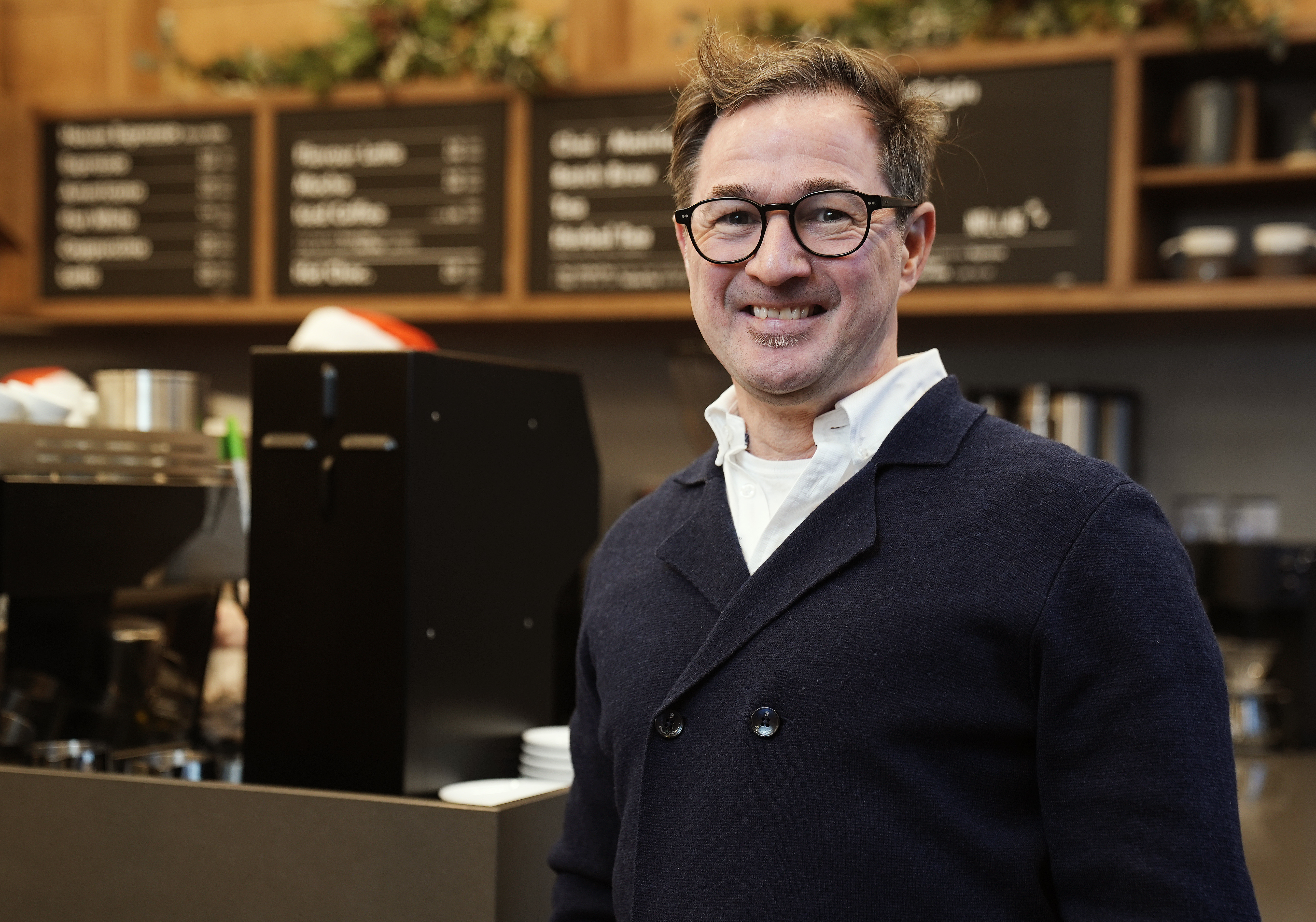 Karl Purdy stands in their Lower Mount Street store