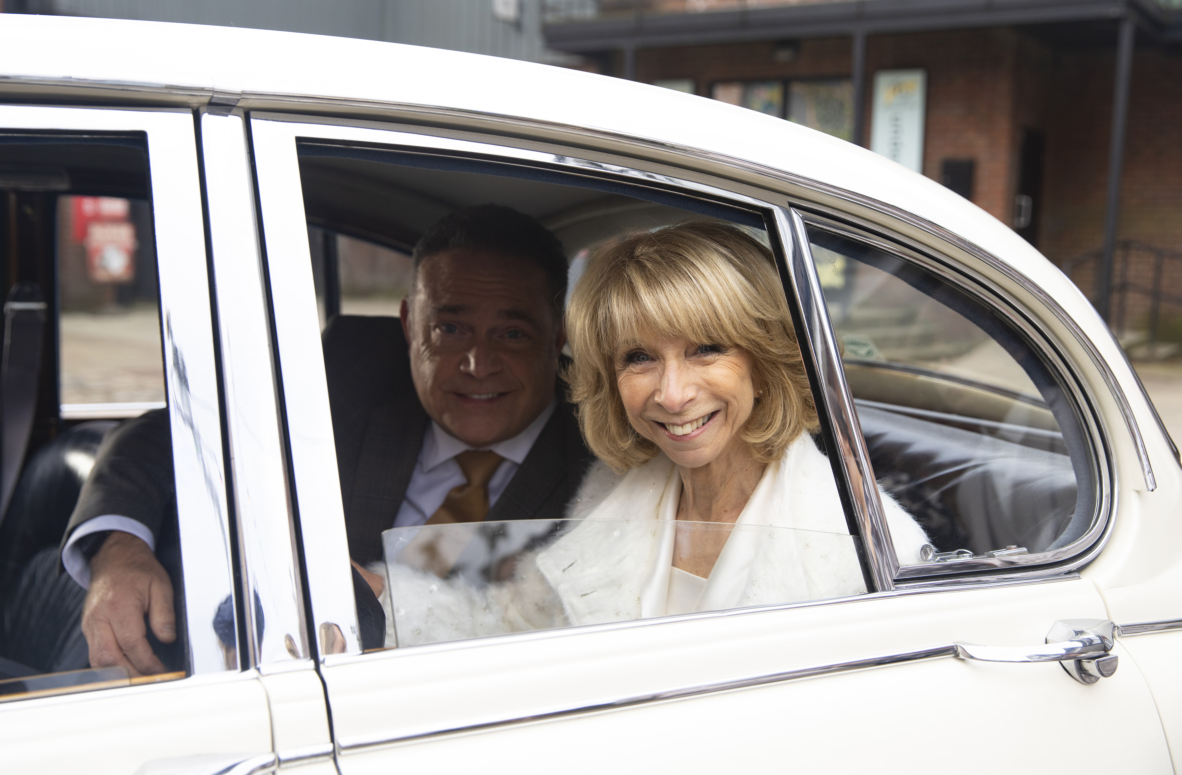 Characters Gail Rodwell and Jesse Chadwick in a car