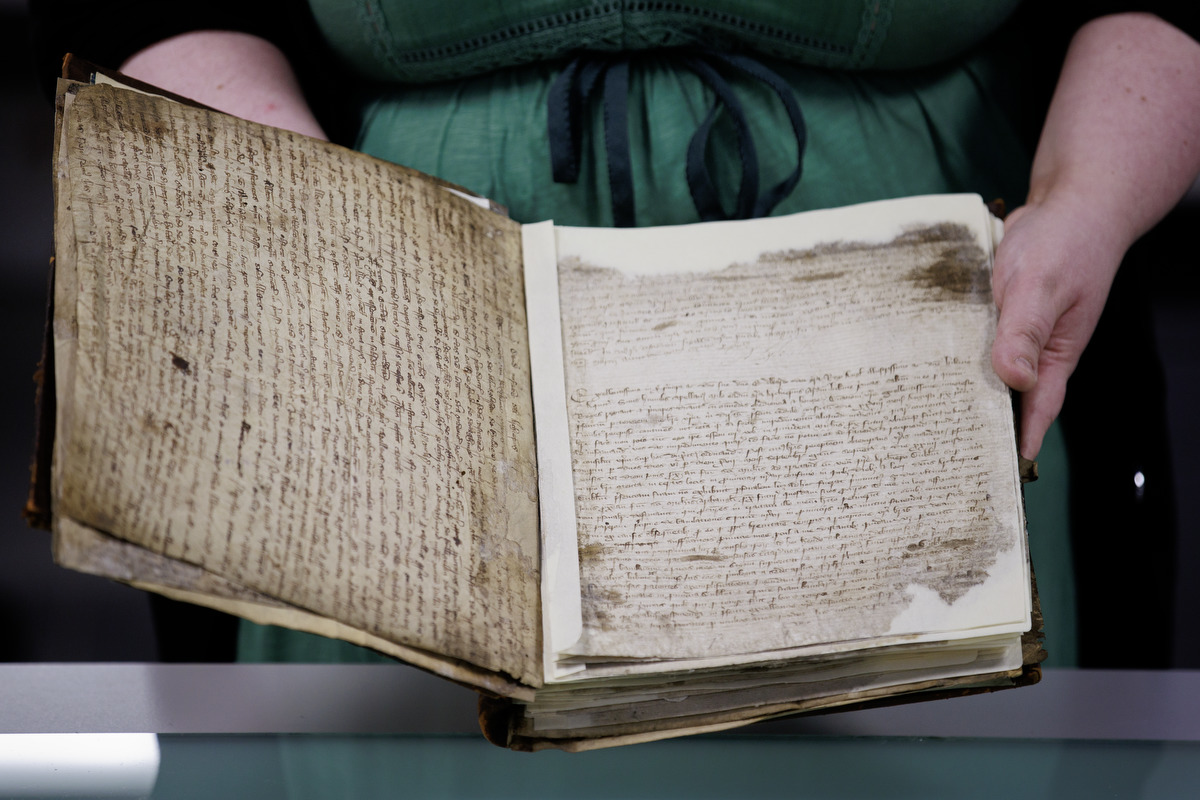 One of the ecclesiastical registers being worked on