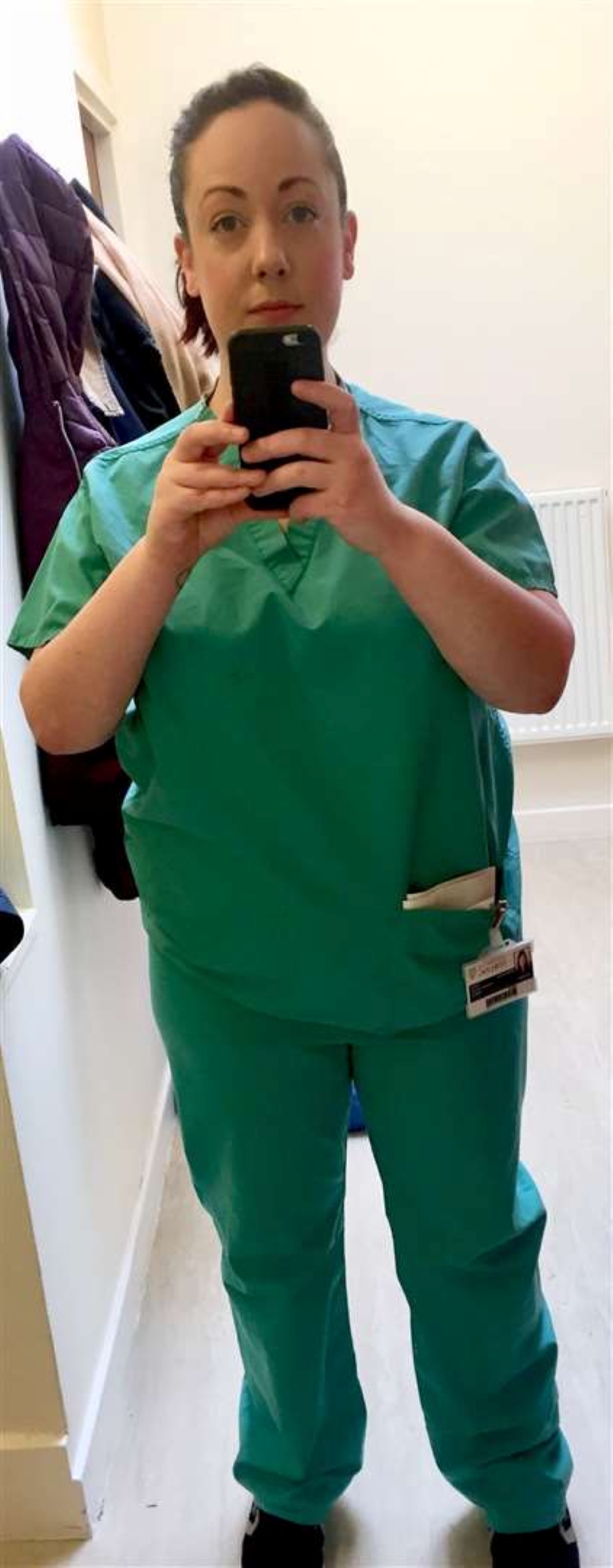 Sheree Gregg in green nursing scrubs