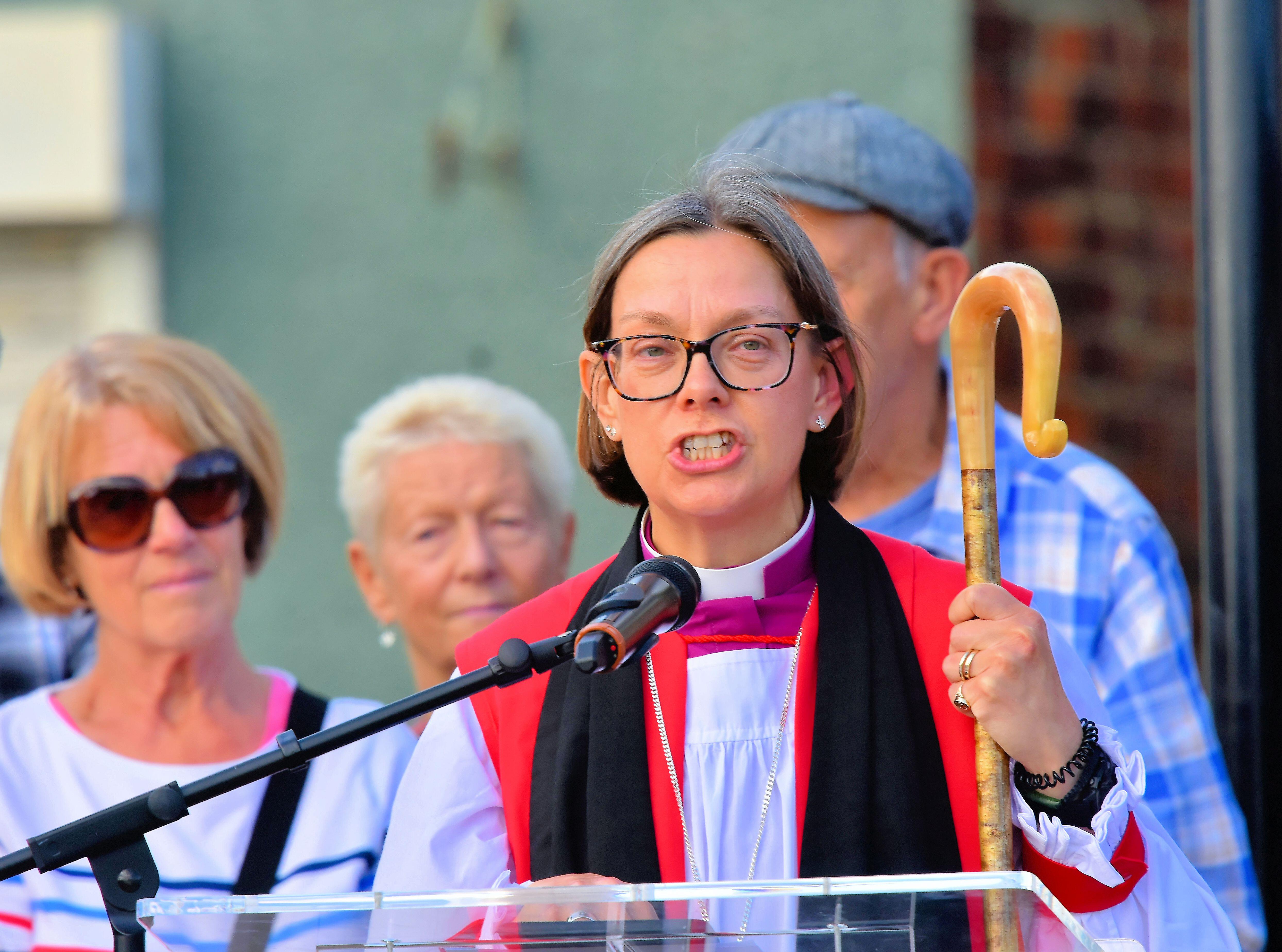 Bishop of Newcastle Helen-Ann Hartley speaking to a crowd 