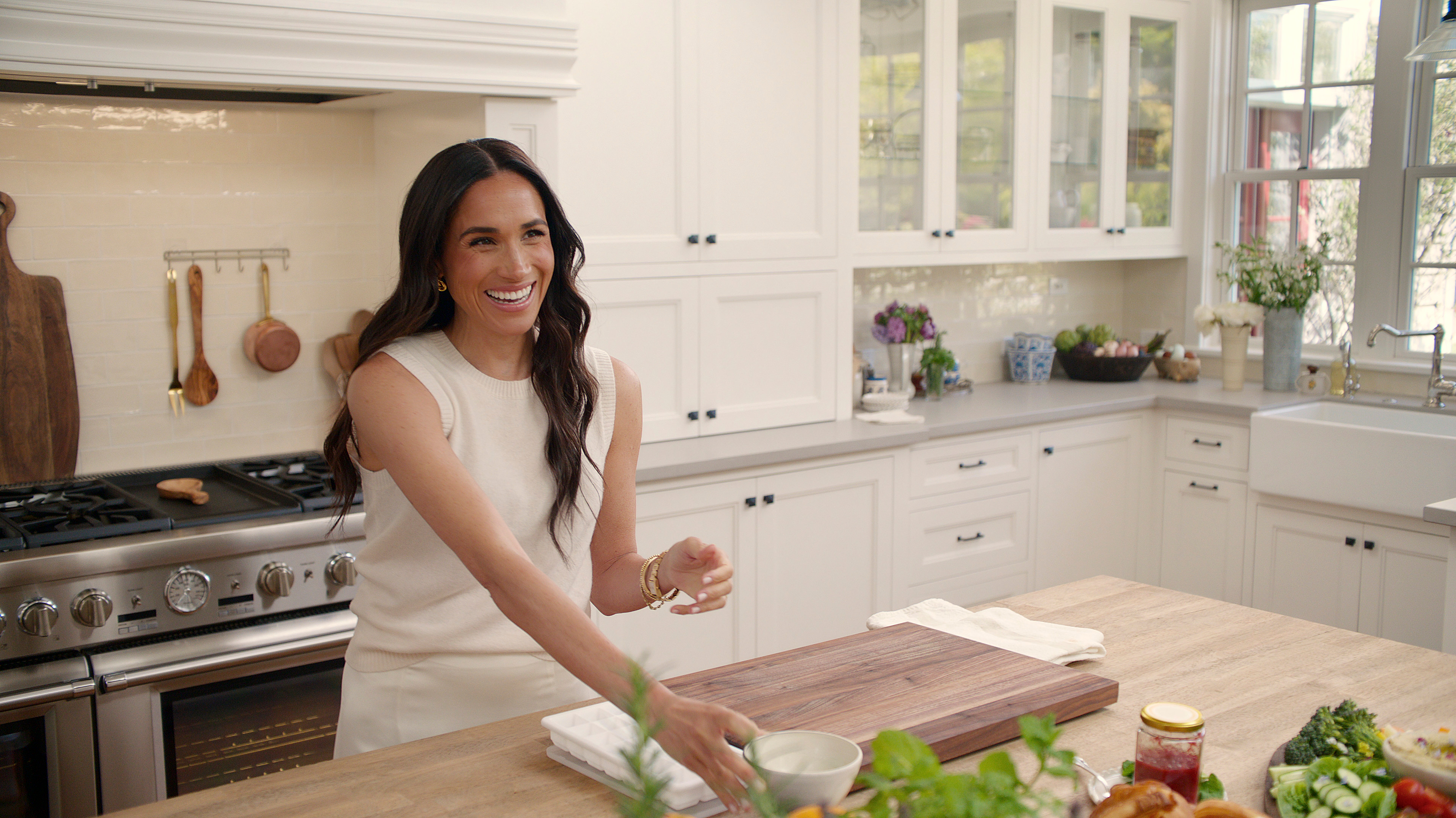 The Duchess of Sussex in a kitchen in an episode from her show