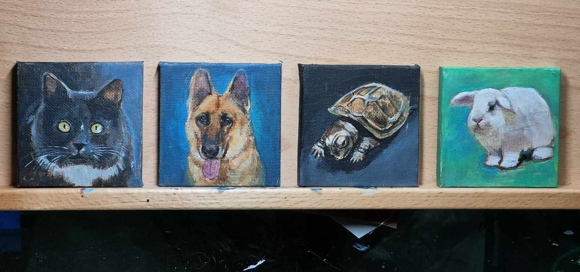 Mini paintings next to each other 