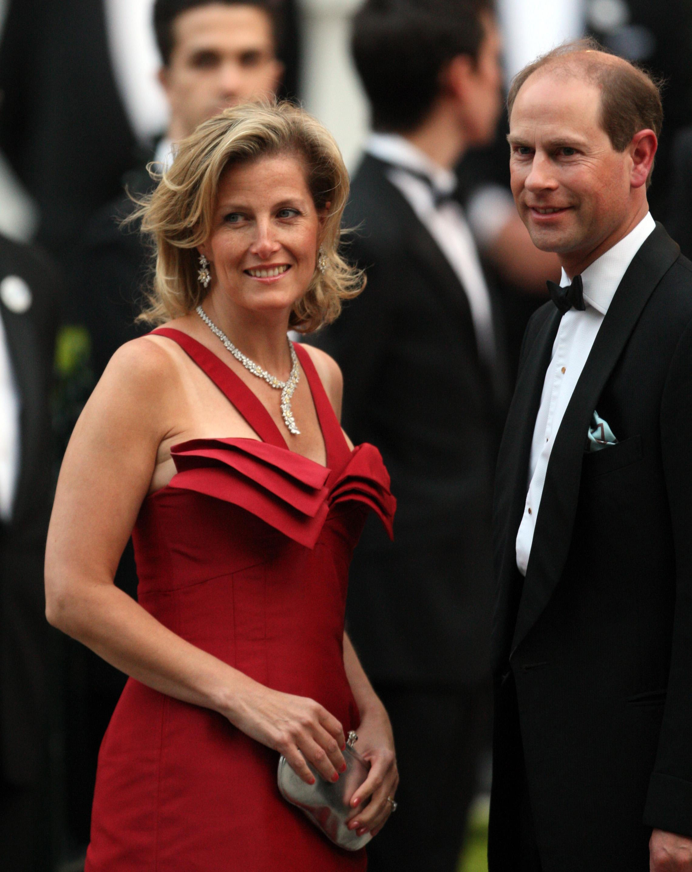 Sophie Countess of Wessex and Edward Earl of Wessex arrive at the Mandarin Oriental Hotel in central London for a reception on the eve of the royal wedding.