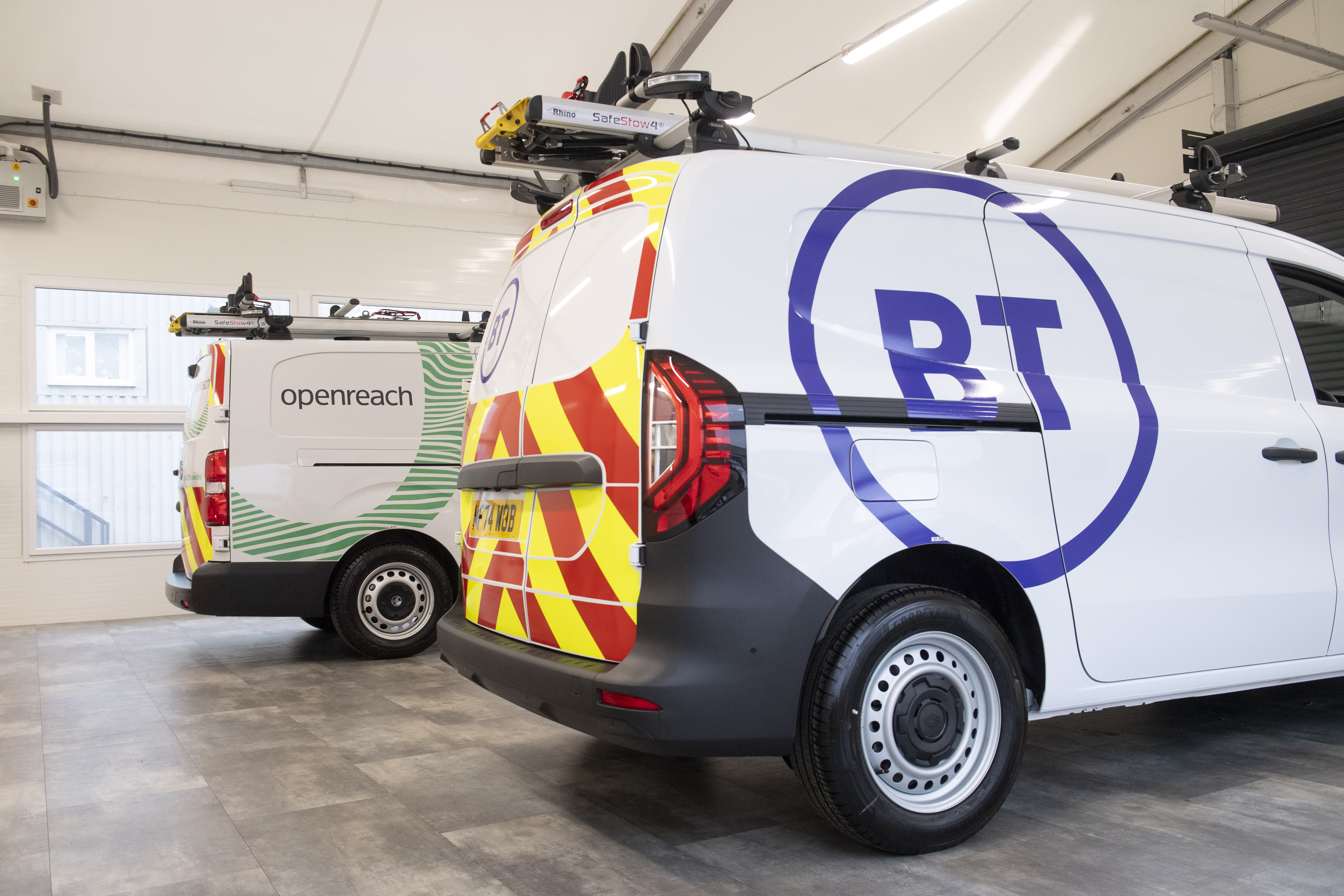 Two of the BT and Openreach electric vehicles