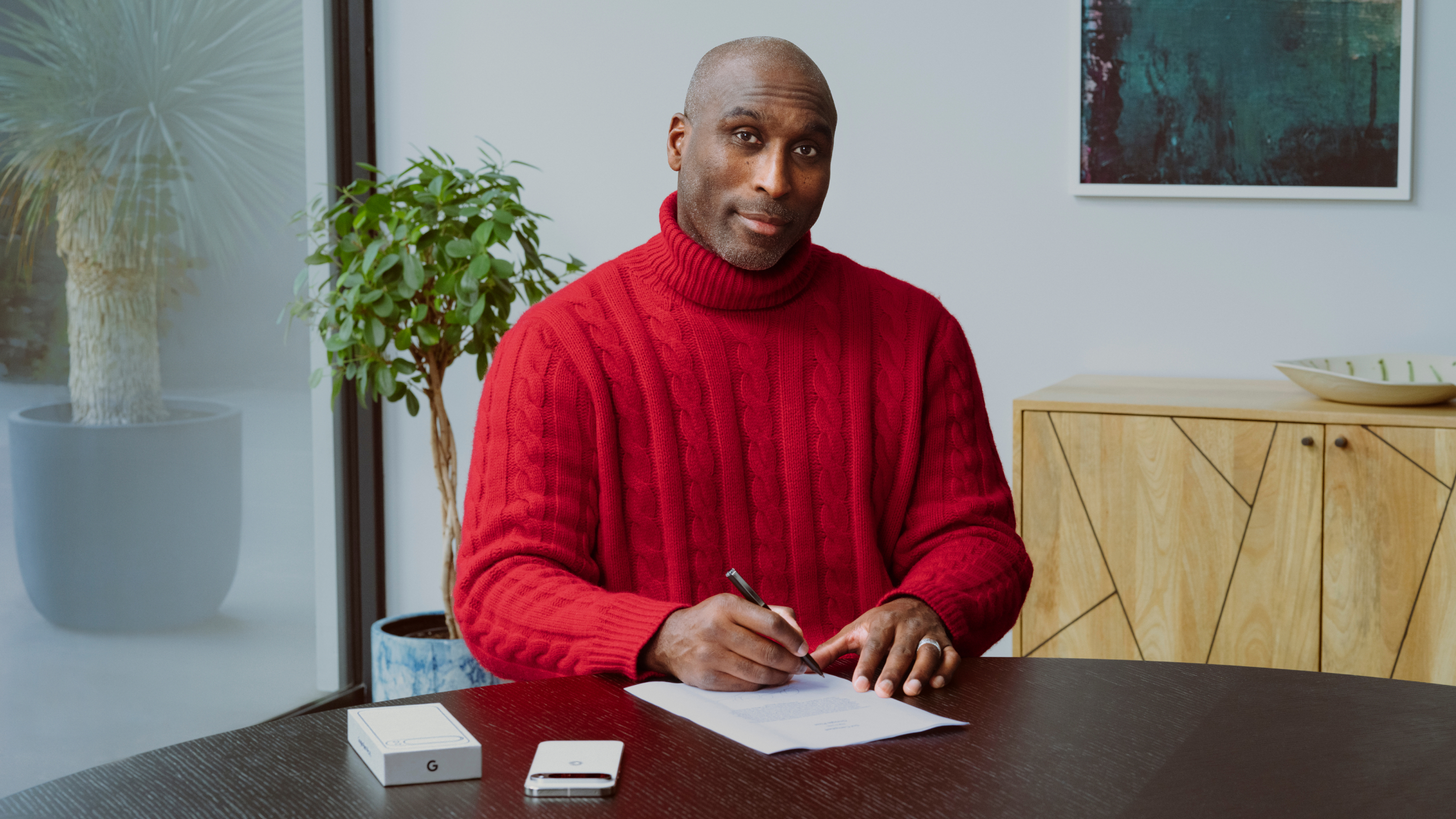 Sol Campbell at a table