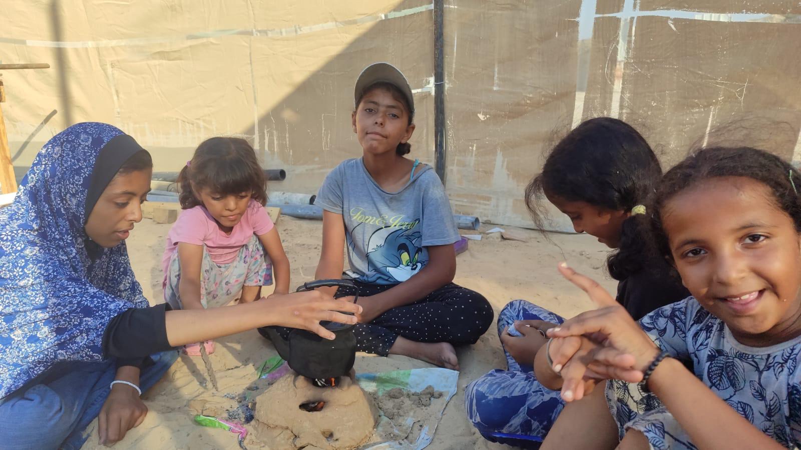 A group of children smiling in Gaza