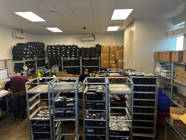 Warehouse of food at a charity preparing meals for firefighters