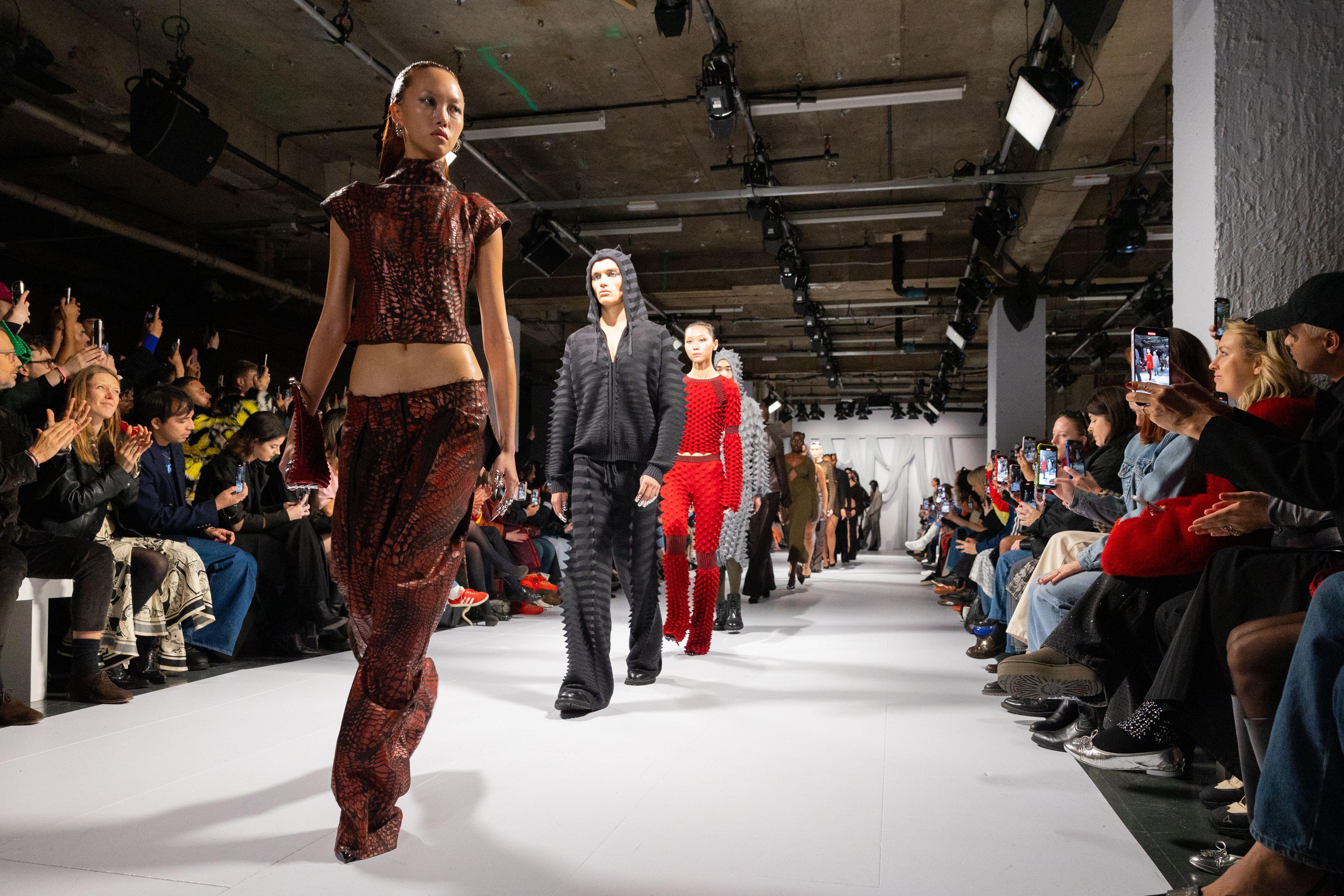 Models walk down runway for Chet Lo shows at London Fashion Week