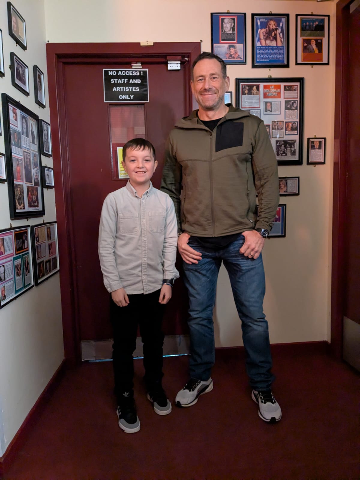 Harvey Dooher smiling next to Jason Fox