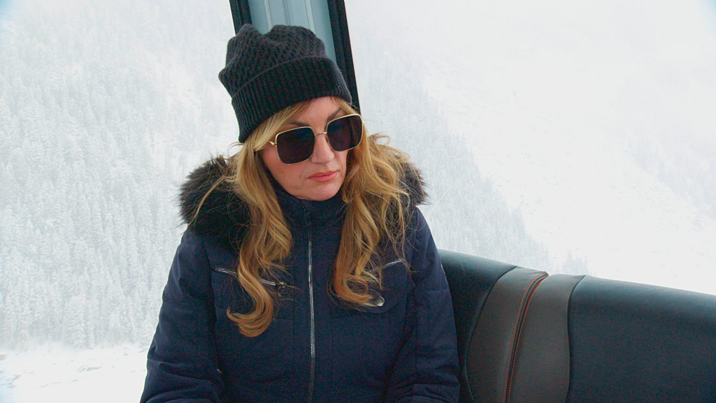 Baroness Brady watches on as the glacier team negotiate 