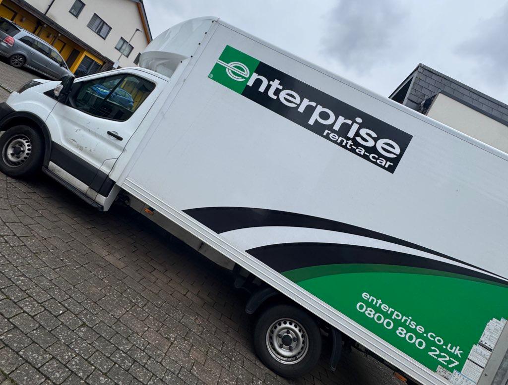 A removals van, containing the Mereu family's belongings, parked on Mrs Mereu's mother's driveway