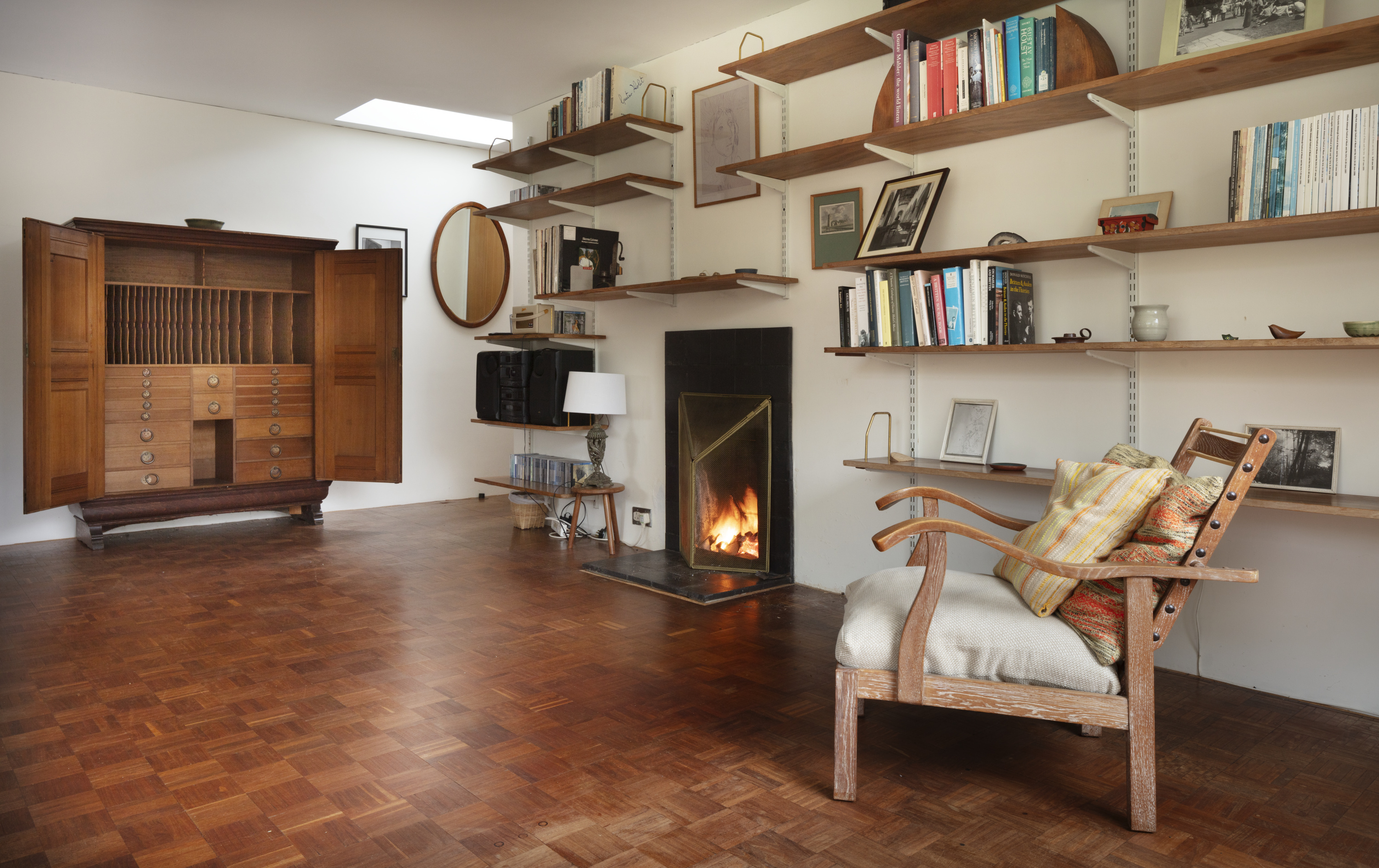 The living room with Gustav Holst's music cupboard