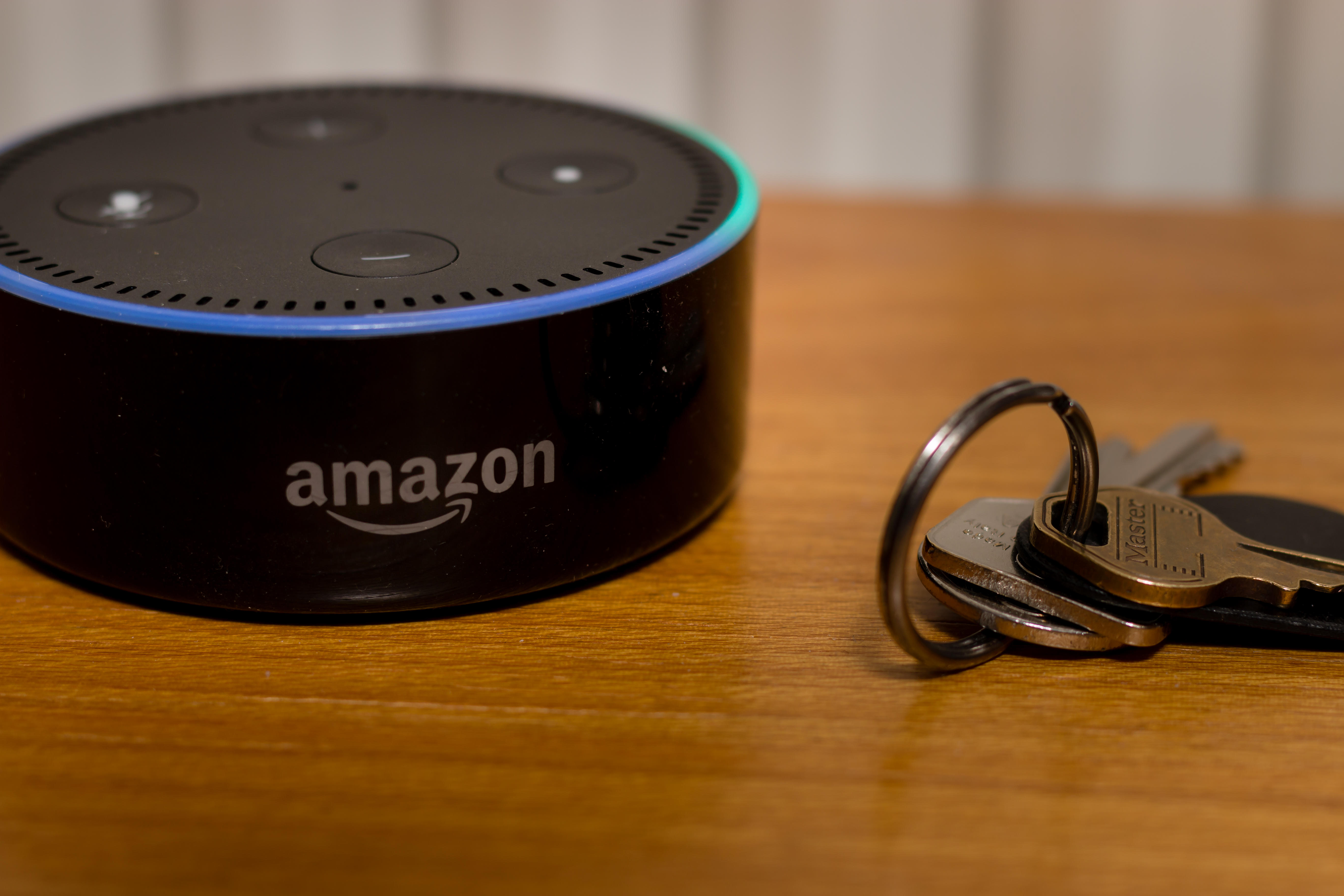 Amazon Echo Dot Alexa on a table near keys