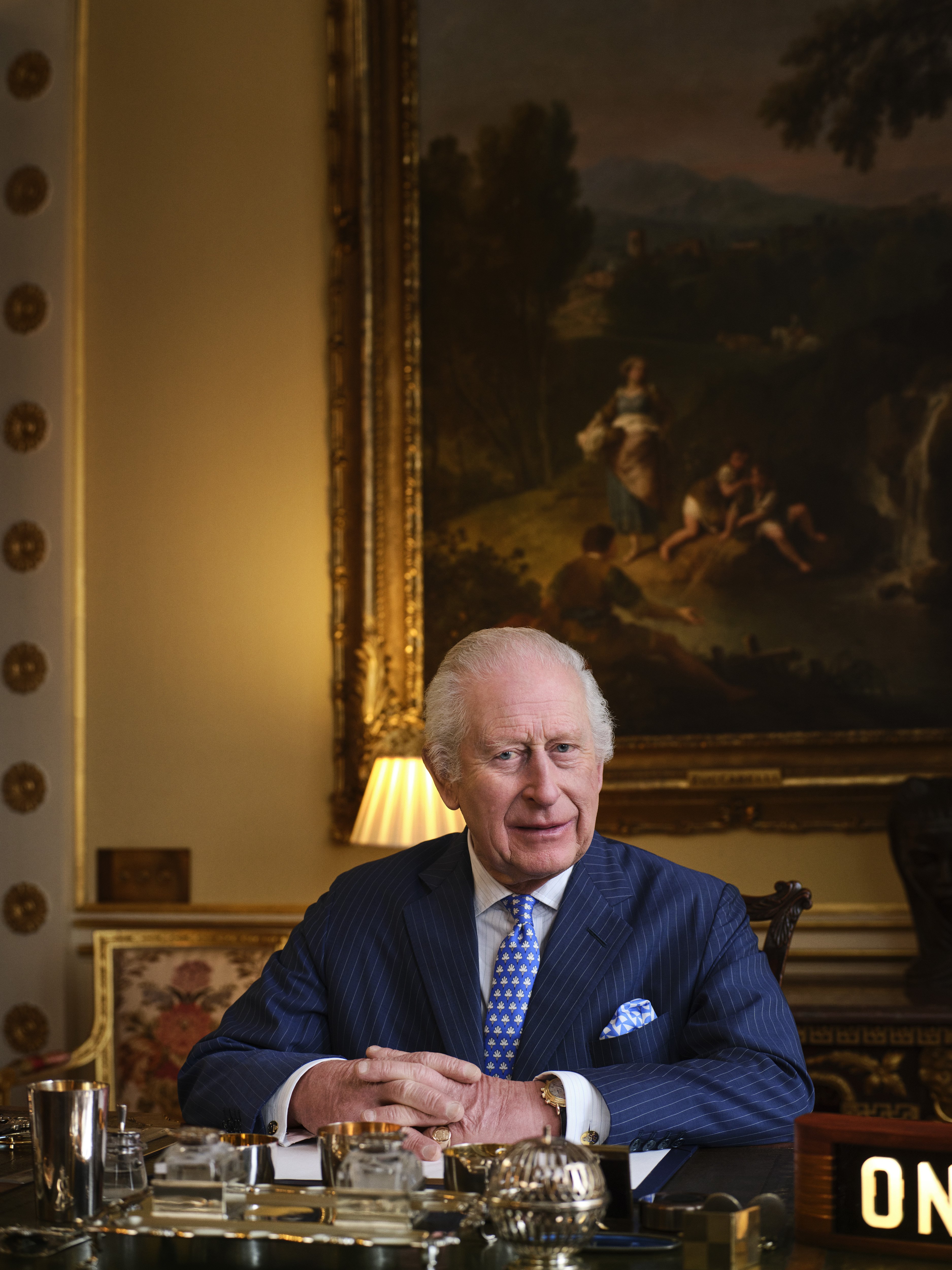 The King sat at his desk in Buckingham Palace recording The King's Music Room for Apple Music 