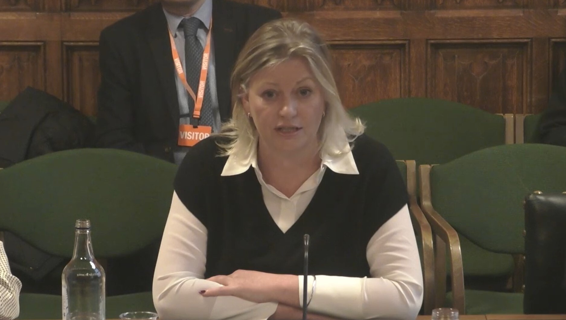 Hayley Valentine seated while speaking to a Commons committee