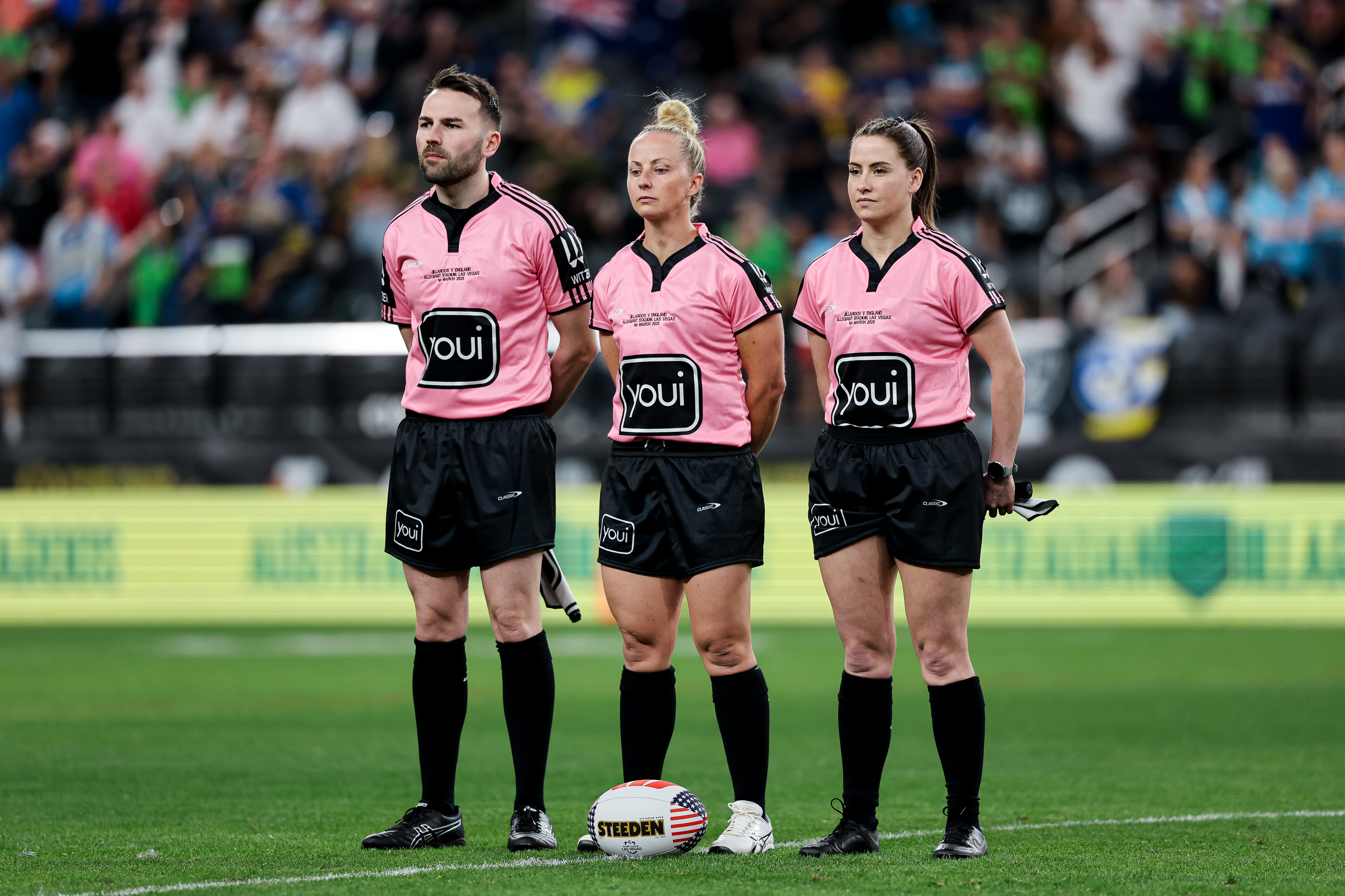 Referee Belinda Sharpe (centre) and touch judges Liam Moore and Tara Jones ahead of the women's international between Australia and England in Las Vegas