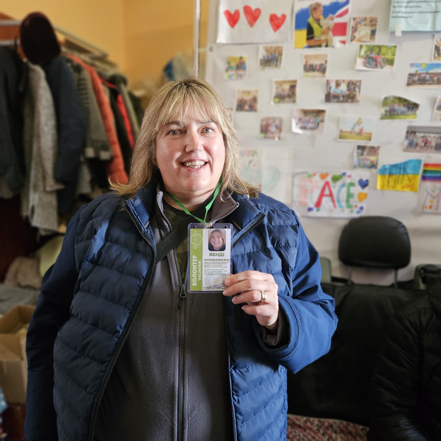 Woman holding card to camera 