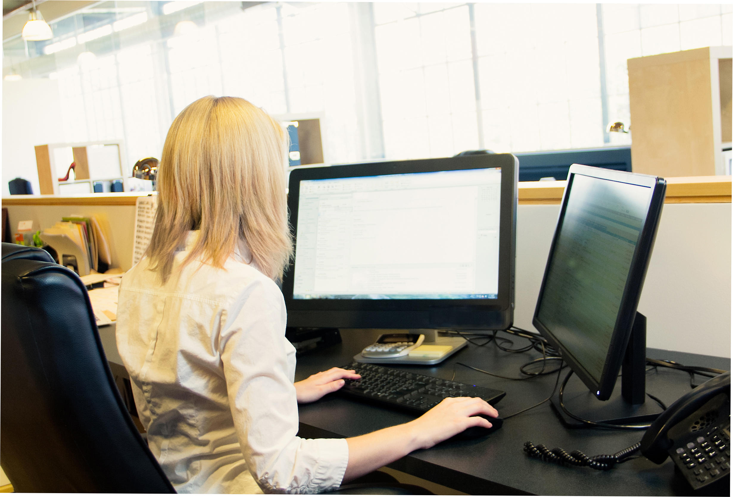 Businesswoman working at a desk in an office