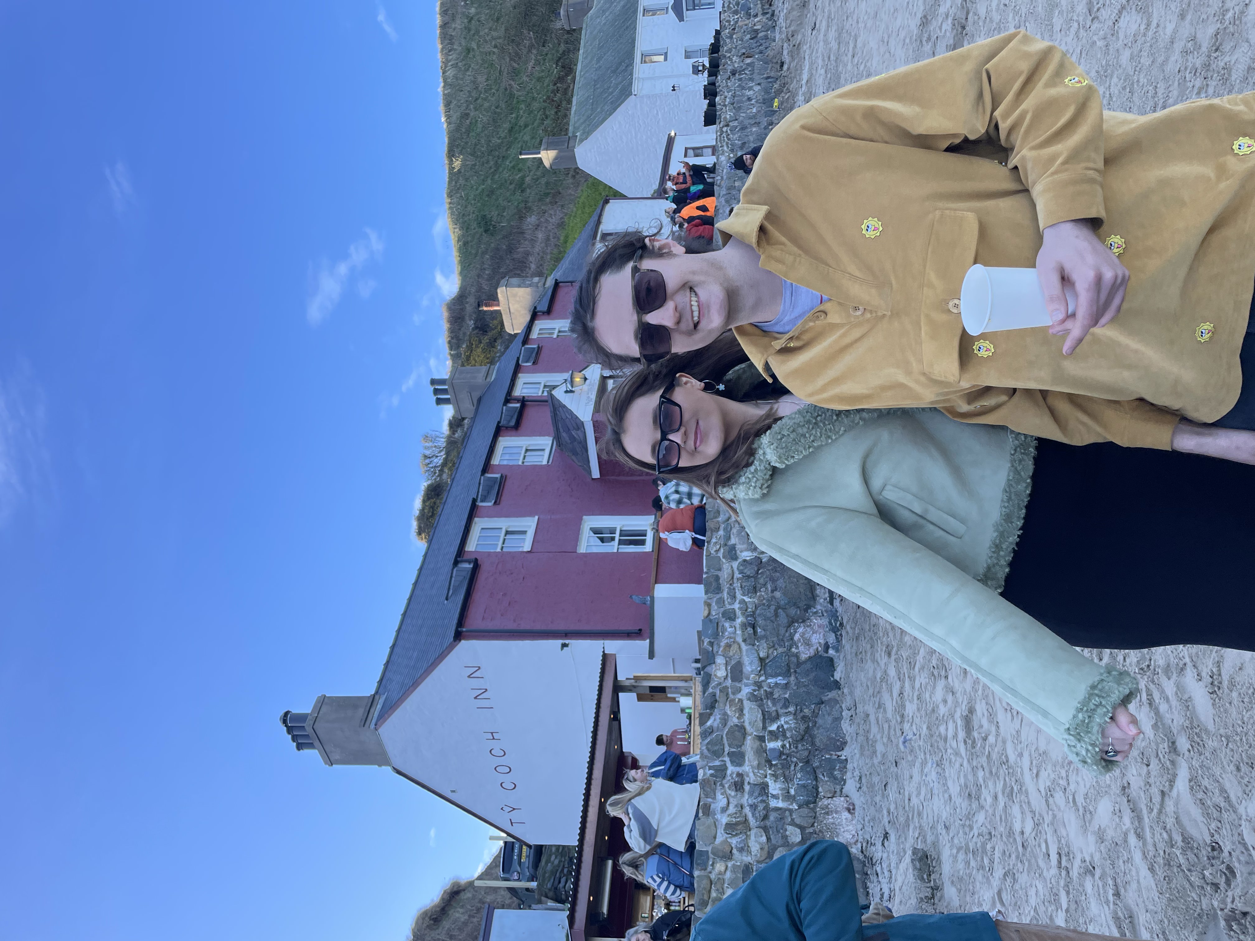 Morgan Elwy with his sister on a beach