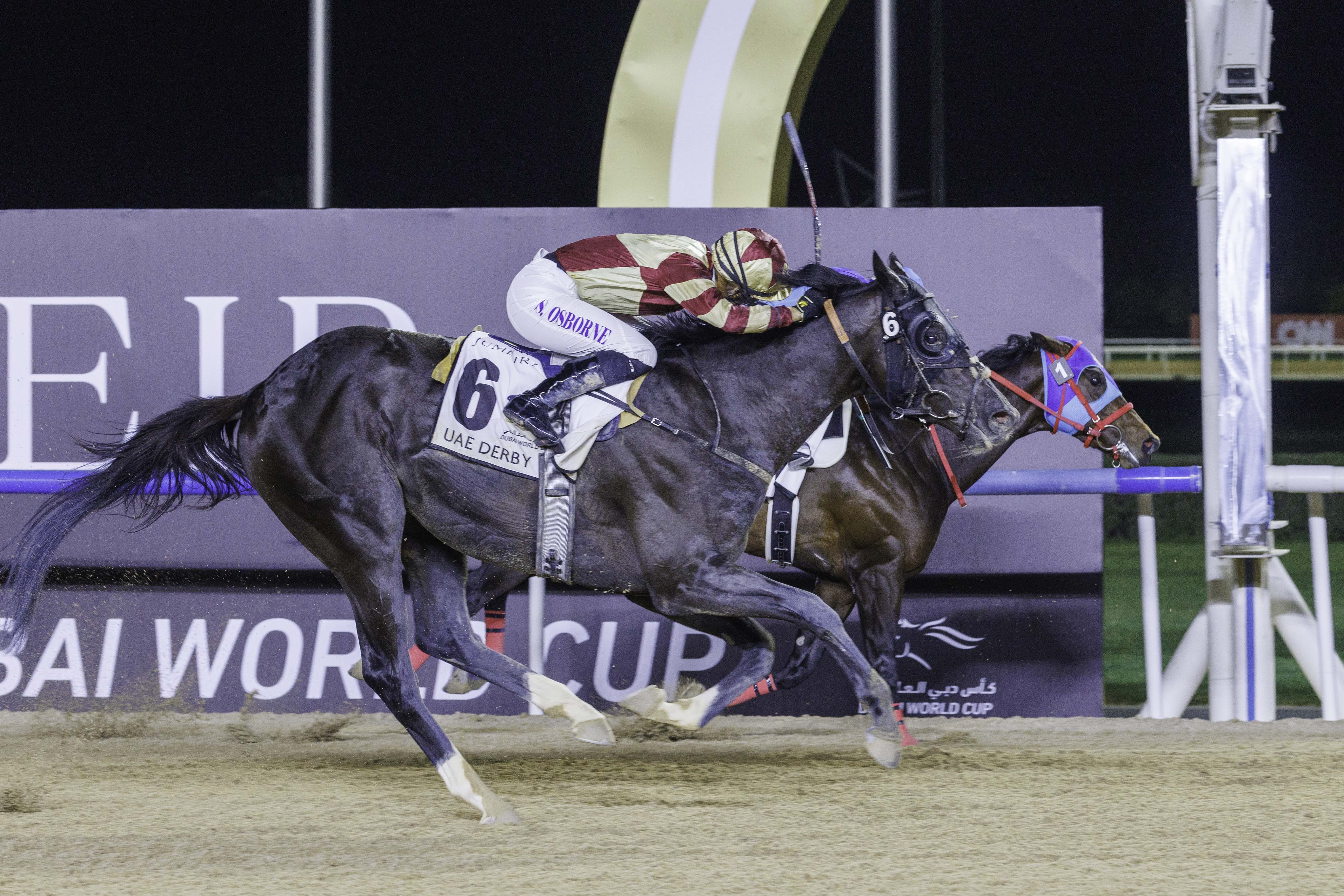 Heart Of Honor (near side) was just touched off in the UAE Derby