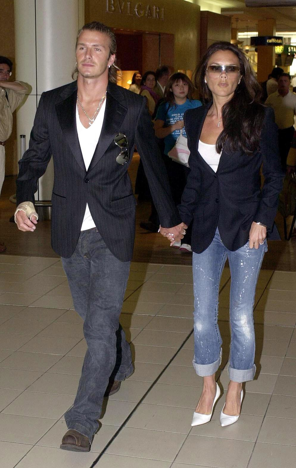 David and Victoria Beckham leave Heathrow for Japan.