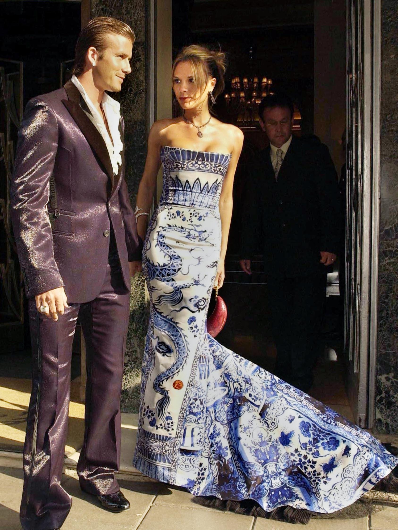 England football captain David Beckham leaves Claridge's with his wife Victoria.