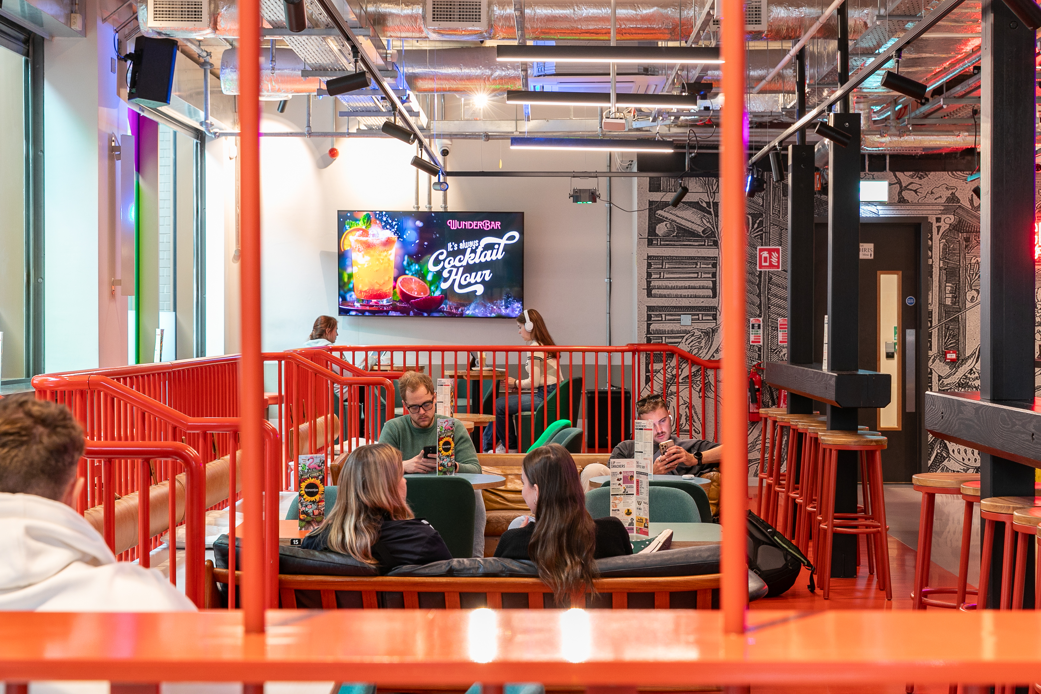 People sitting in a bar area