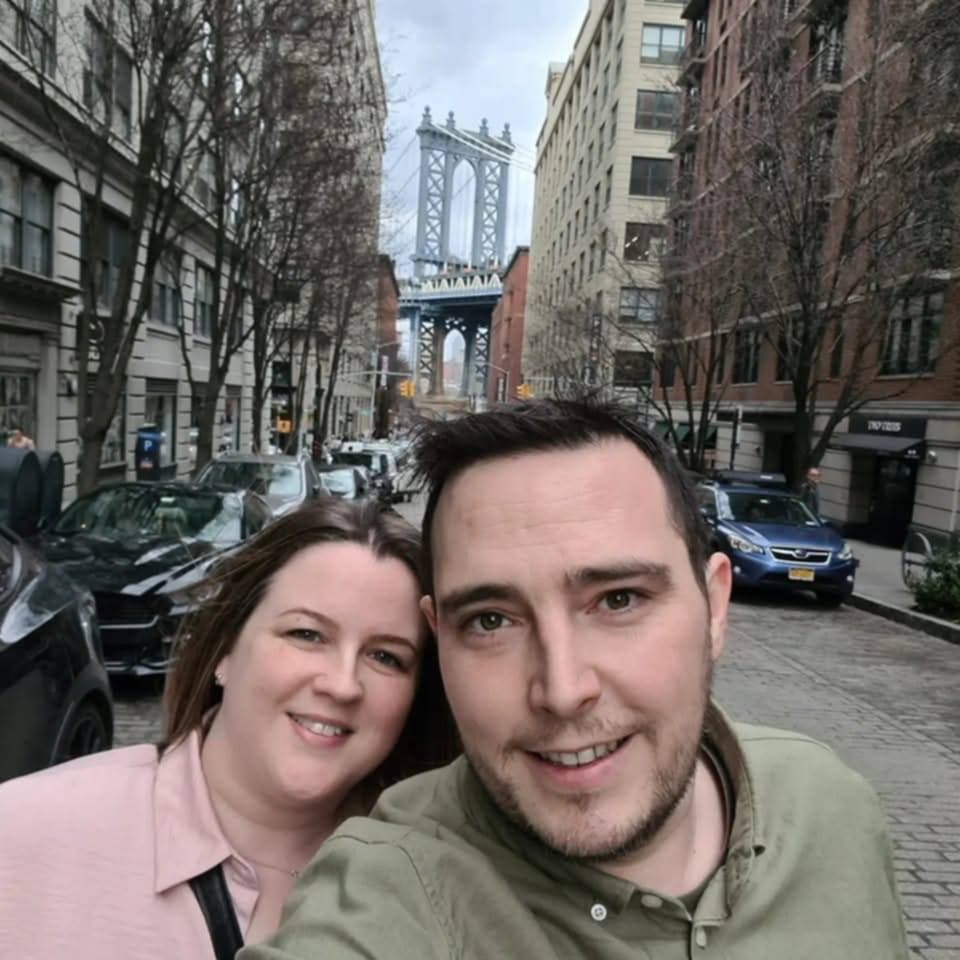 Woman and man looking at the camera 