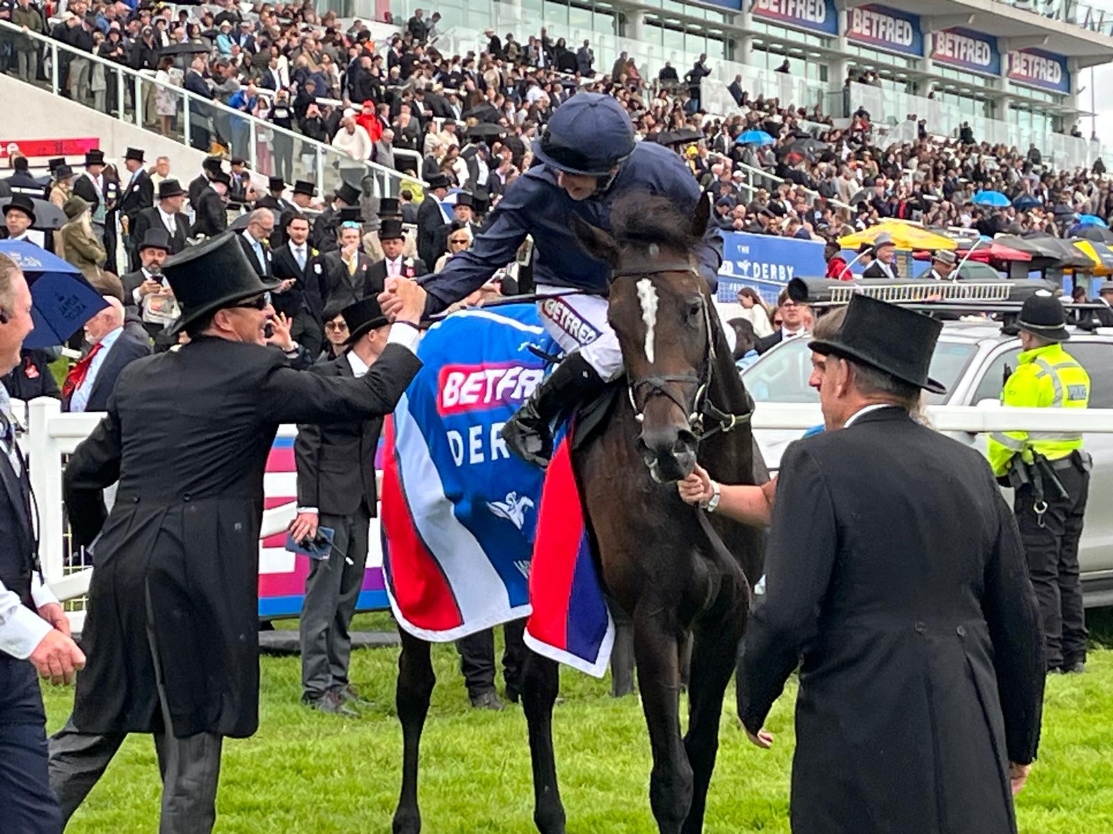 Aidan O'Brien congratulates Wayne Lordan aboard Lambourn