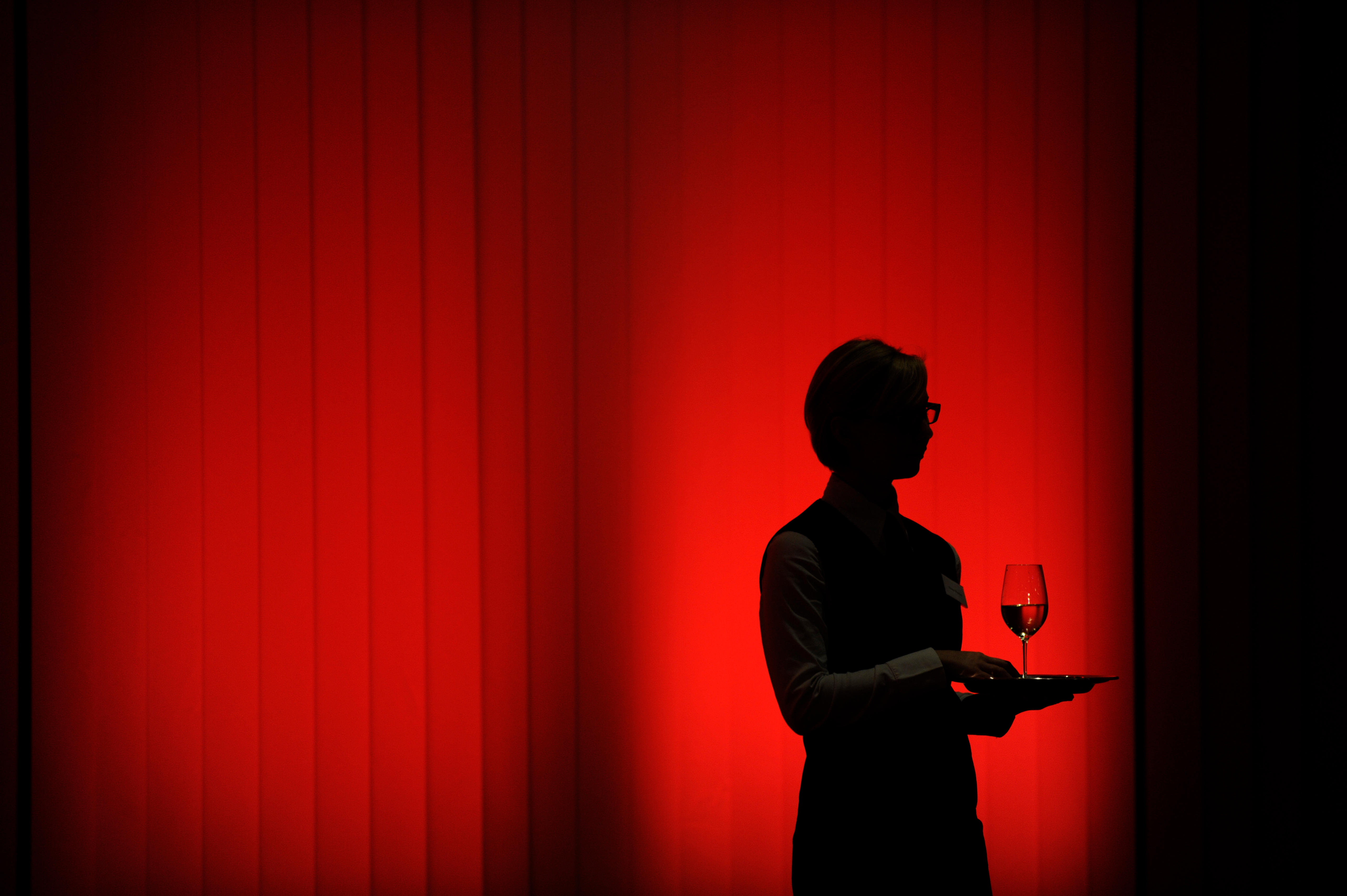 A waitress in silhouette