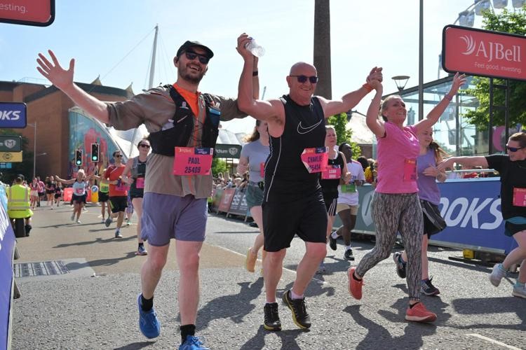 Paul Edwards (far left) completing the 2025 Bristol 10k with his father, Charlie Edwards, and sister (Paul Edwards/PA)