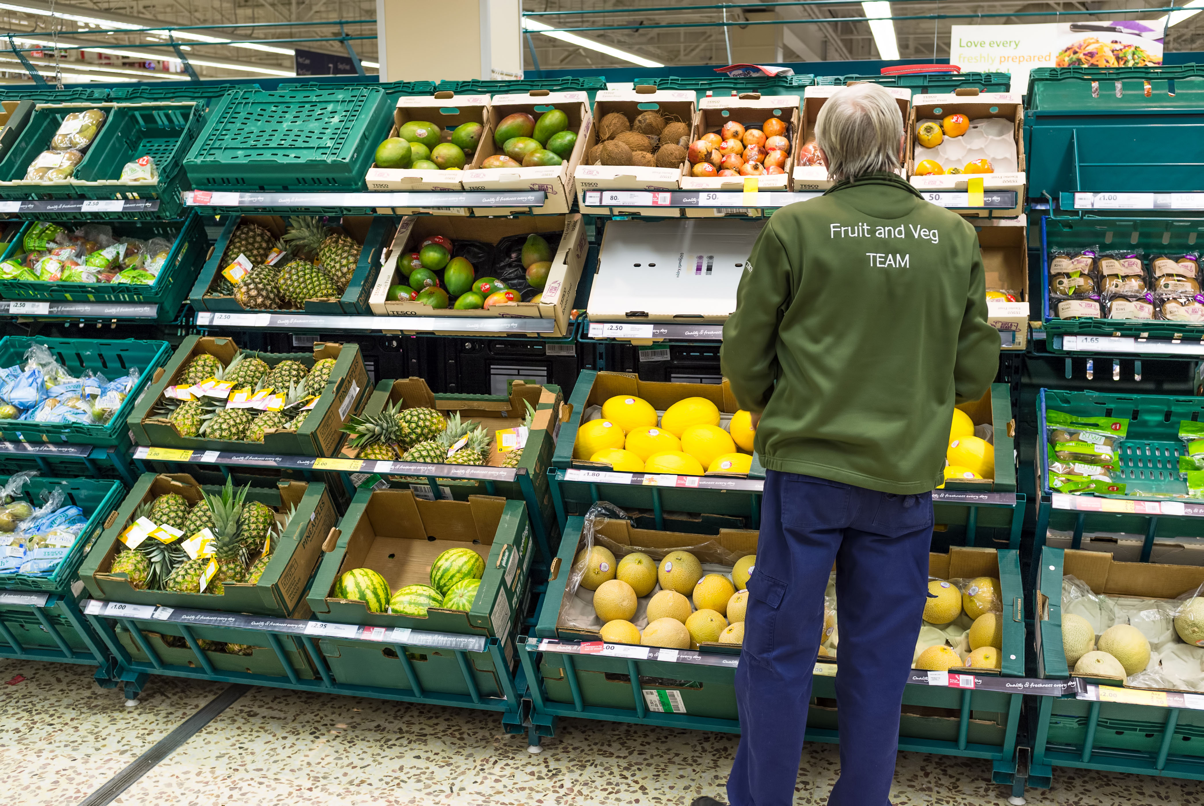 A member of staff at work in Tesco
