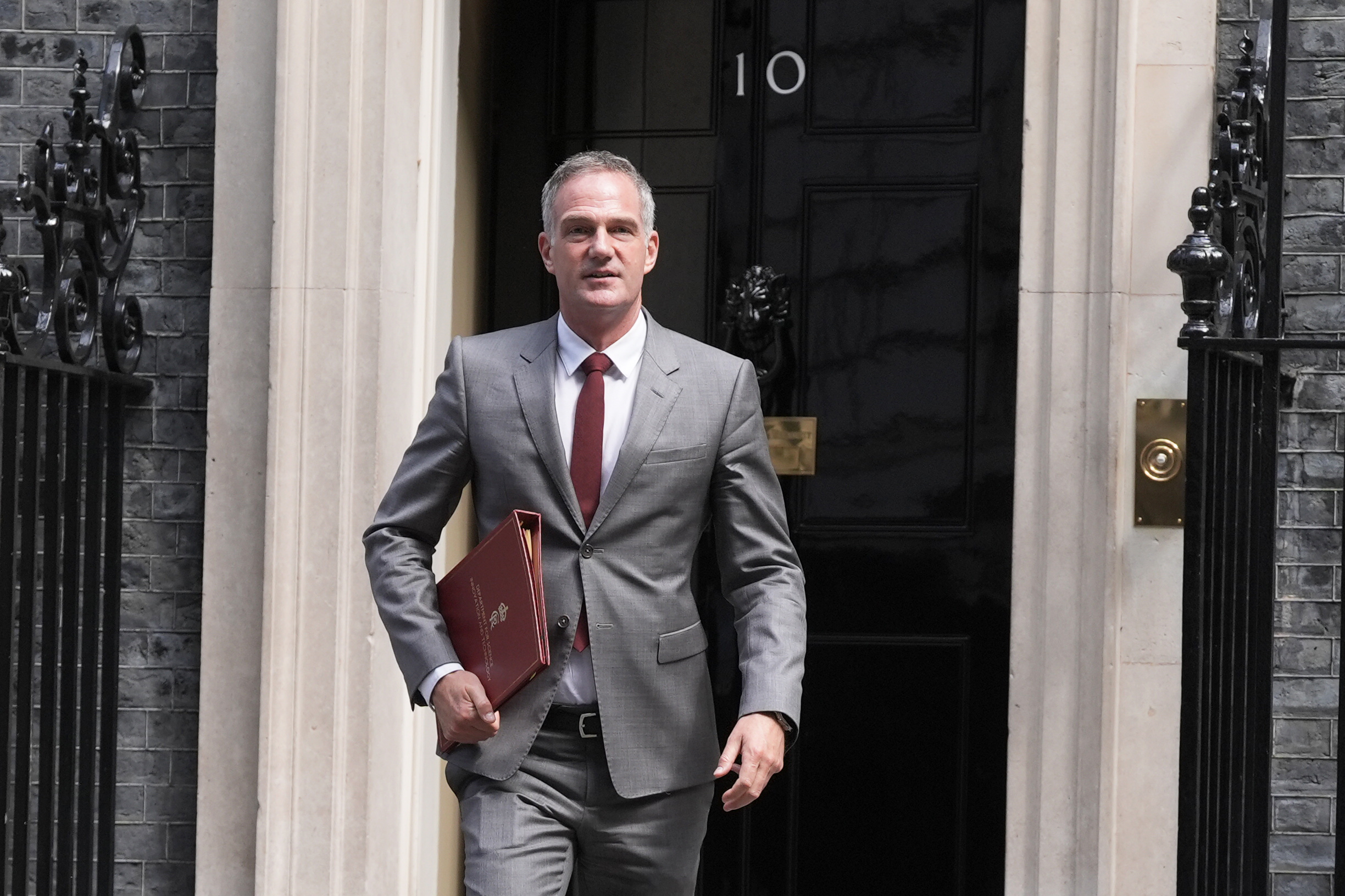 Peter Kyle leaving 10 Downing Street with his ministerial folder under his arm