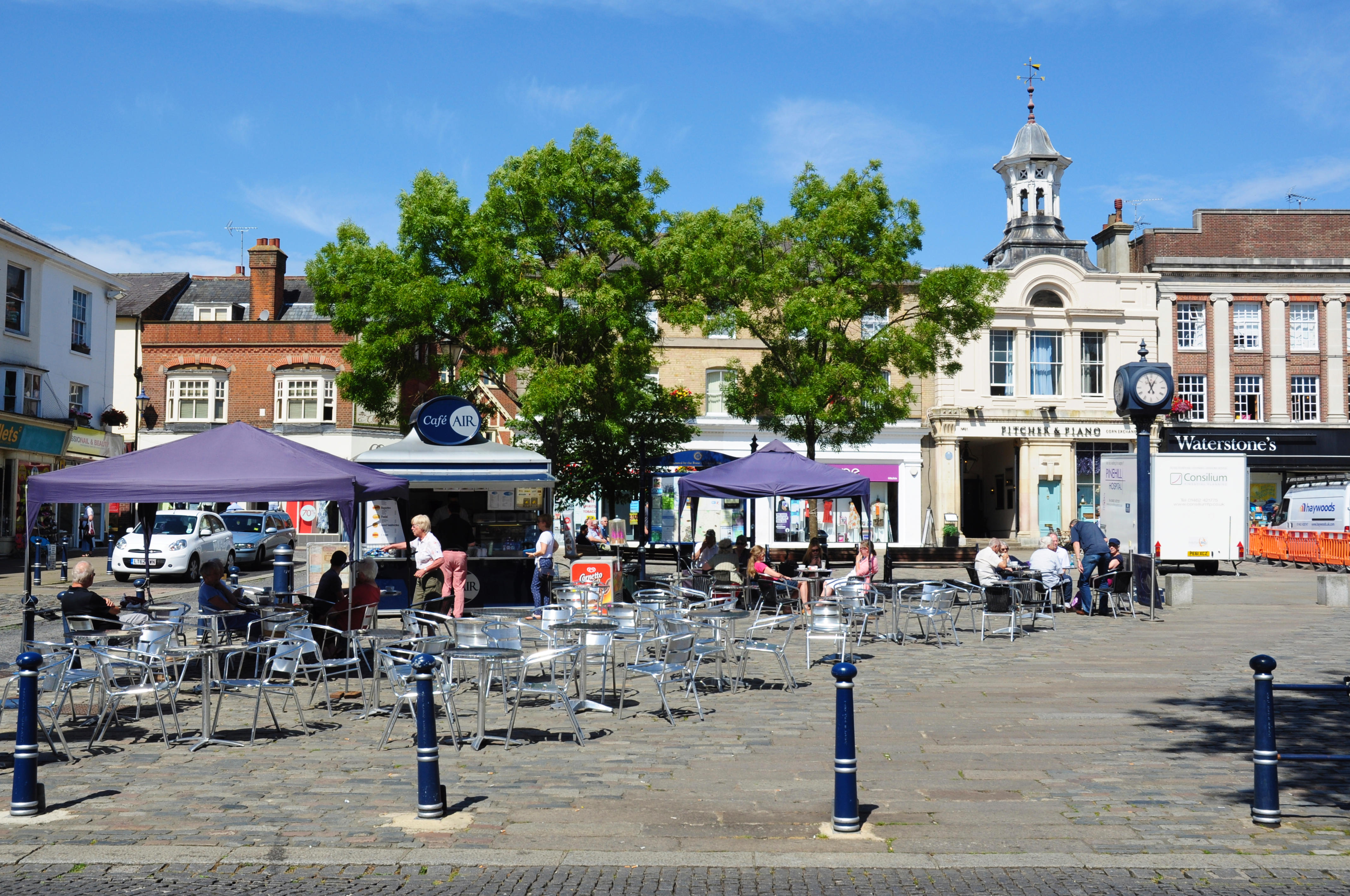 Tables in the market place in Hitchin in Hertfordshire