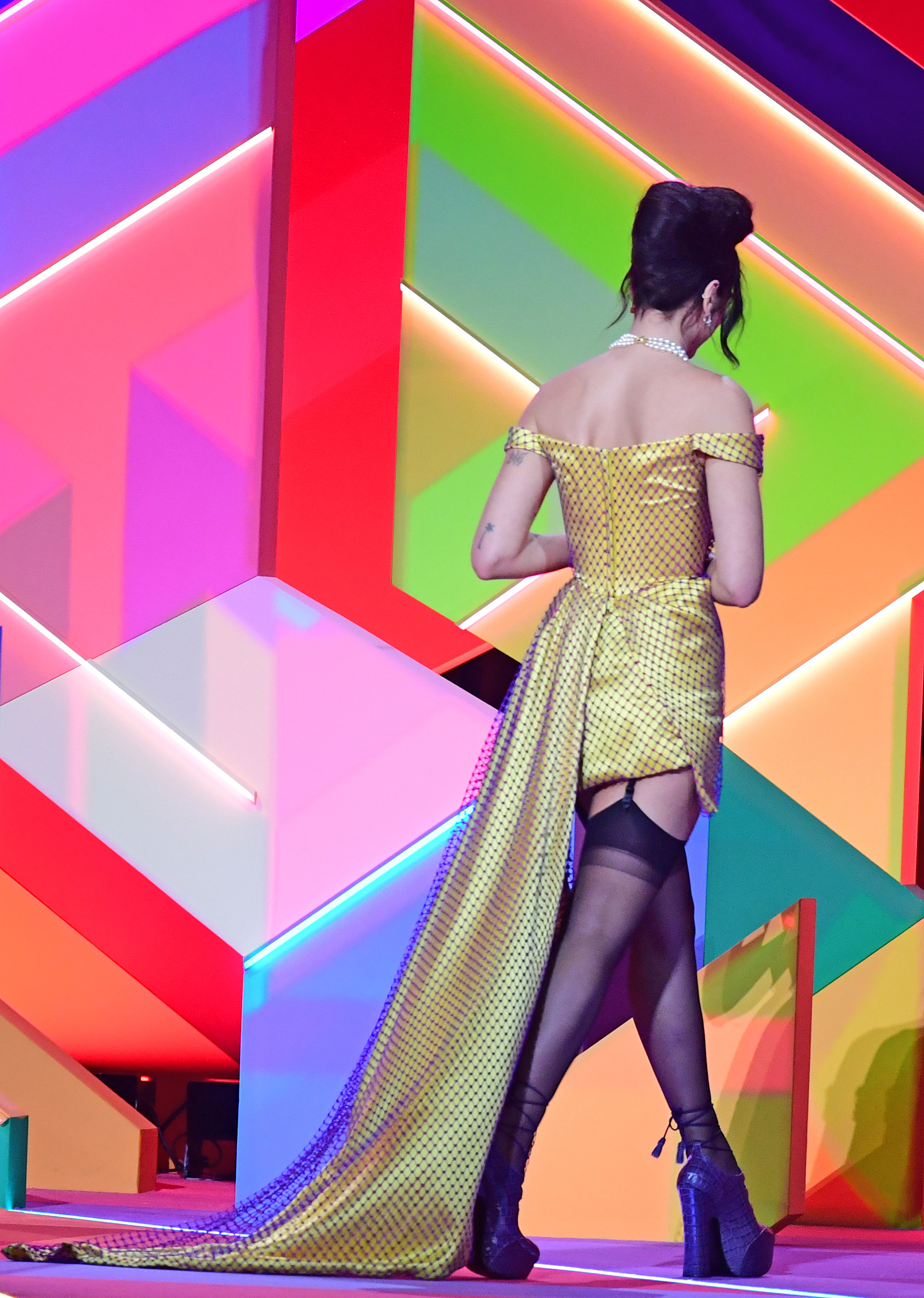 Dua Lipa leaves the stage after collecting the award for Best Album during the Brit Awards 2021 at the O2 Arena, London. Picture date: Tuesday May 11, 2021.