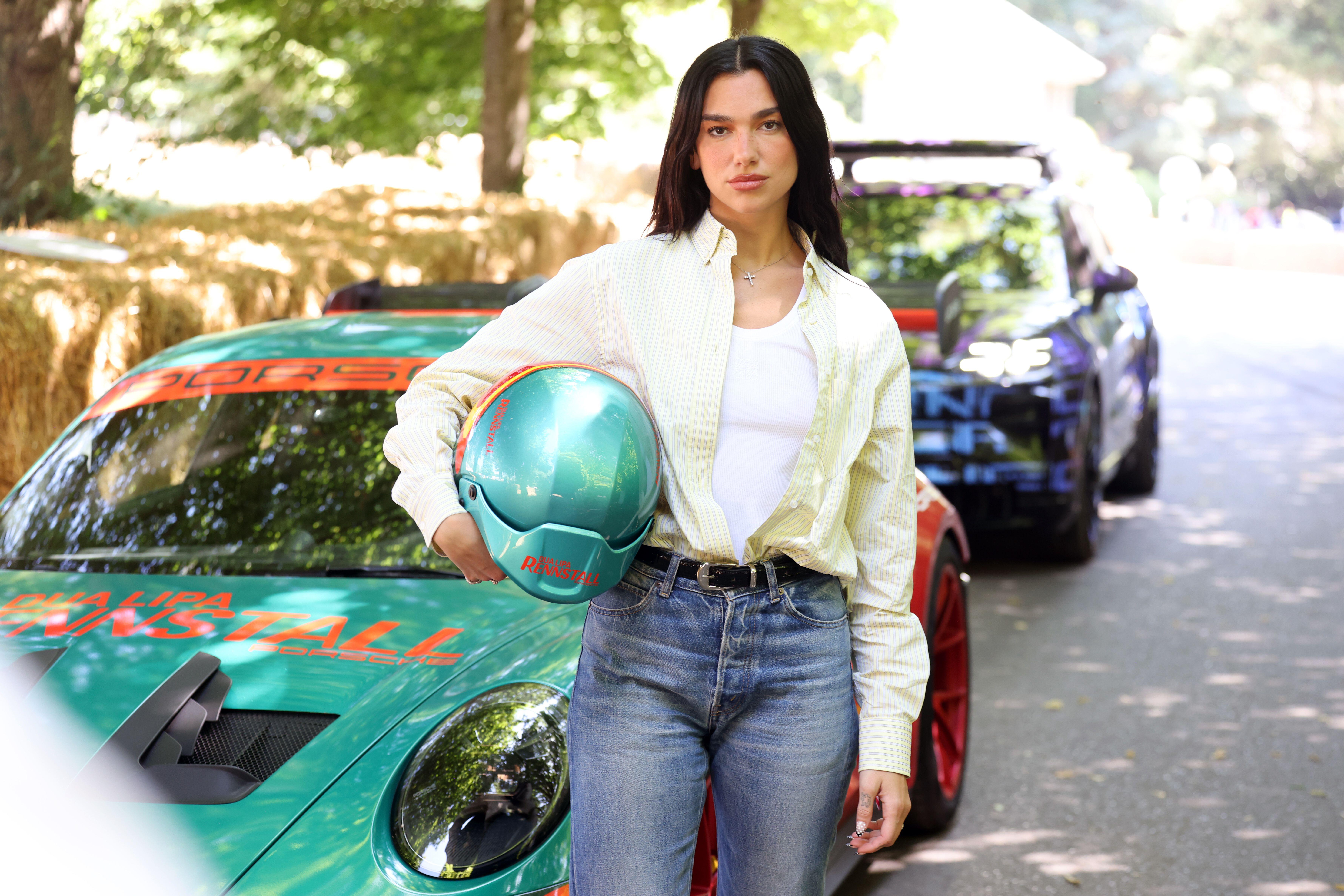Dua Lipa at the Goodwood Festival of Speed, where she went up the world famous hillclimb today in the Dua Lipa Renstall Porsche 911 GT3 RS driven by Iron Dames racing driver Karen Gaillard (not pictured) at Goodwood Festival of Speed presented by Masterca