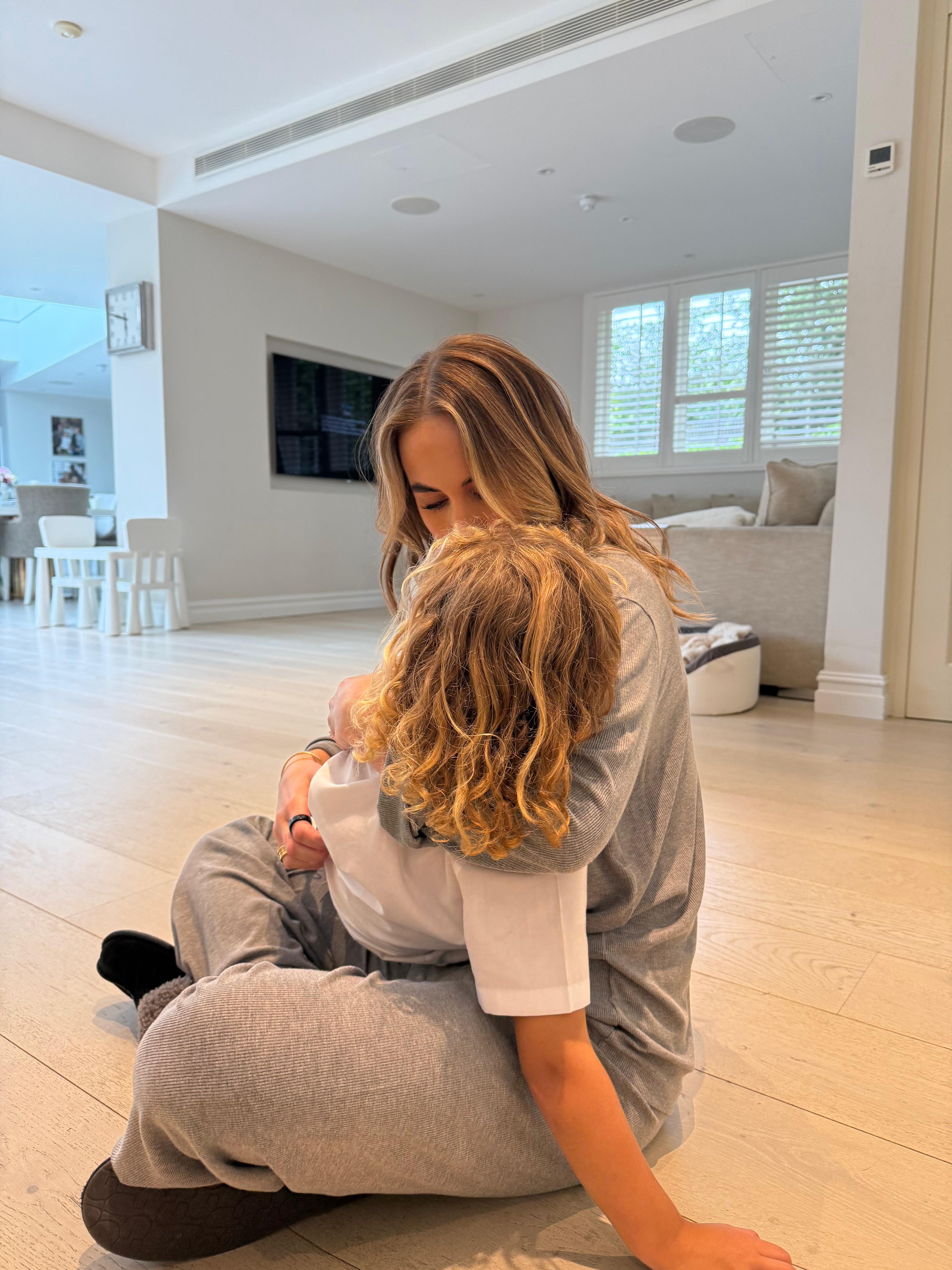 Kate Ferdinand hugs her son Cree (Kate Ferdinand/PA)